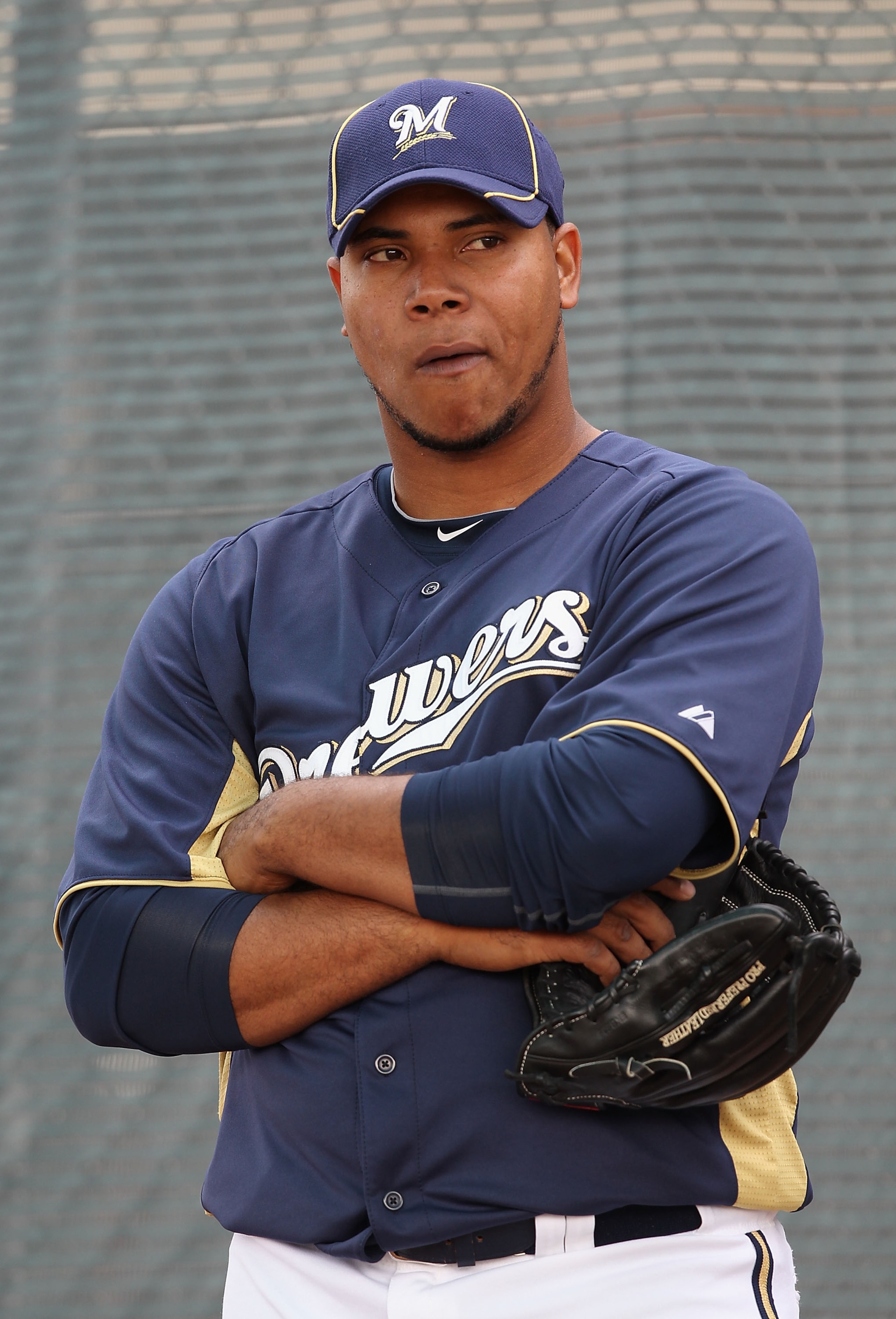 PHOENIX, AZ - FEBRUARY 18: Pitcher Wily Peralta #73 of the Milwaukee Brewers listens to coaches during a MLB spring training practice at Maryvale Baseball Park on February 18, 2011 in Phoenix, Arizona. (Photo by Christian Petersen/Getty Images) PHOENIX, AZ - FEBRUARY 18: Pitcher Wily Peralta #73 of the Milwaukee Brewers listens to coaches during a MLB spring training practice at Maryvale Baseball Park on February 18, 2011 in Phoenix, Arizona. (Photo by Christian Petersen/Getty Images)