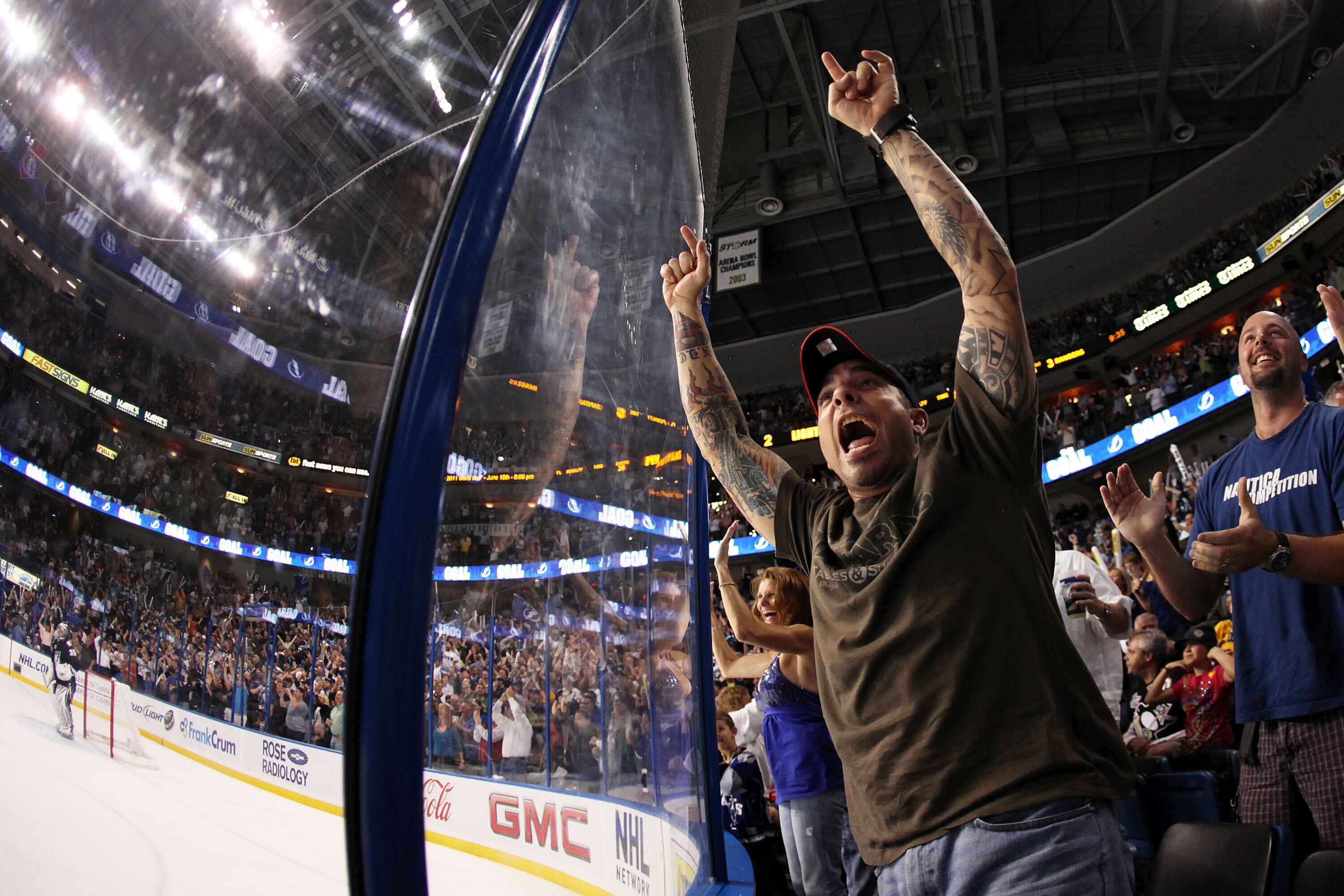 TAMPA, FL - APRIL 20: Tampa Bay Lightning fans cheer on their team against Pittsburgh Penguins in Game Four of the Eastern Conference Quarterfinals during the 2011 NHL Stanley Cup Playoffs at the St. Pete Times Forum on April 20, 2011 in Tampa, Florida. (