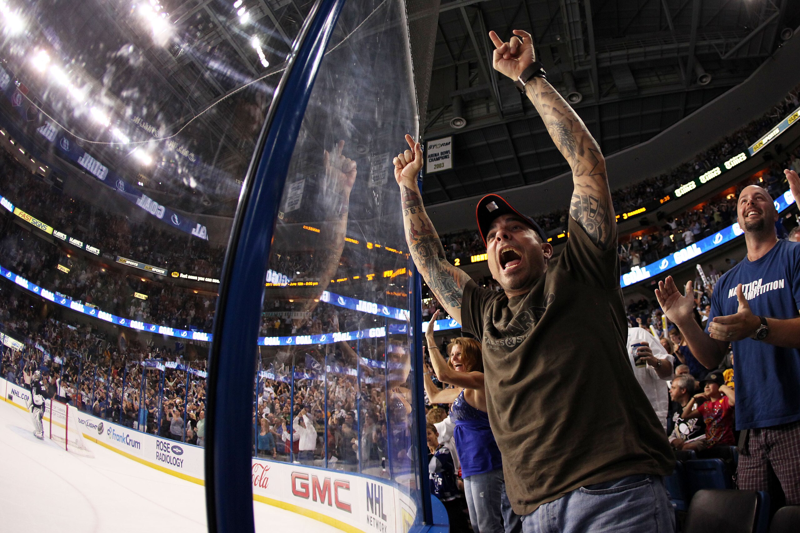 TAMPA, FL - APRIL 20: Tampa Bay Lightning fans cheer on their team against Pittsburgh Penguins in Game Four of the Eastern Conference Quarterfinals during the 2011 NHL Stanley Cup Playoffs at the St. Pete Times Forum on April 20, 2011 in Tampa, Florida. (