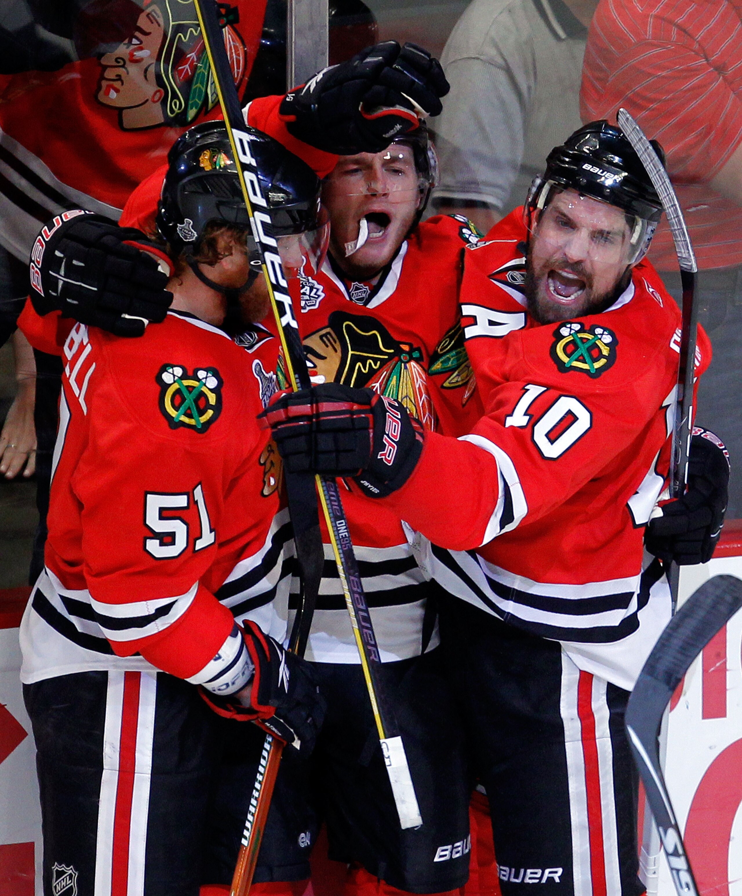 CHICAGO - JUNE 06: Patrick Kane #88 of the Chicago Blackhawks celebrates with teammates Brian Campbell #51 and Patrick Sharp #10 after scoring a goal in the second period against the Philadelphia Flyers in Game Five of the 2010 NHL Stanley Cup Final at t CHICAGO - JUNE 06: Patrick Kane #88 of the Chicago Blackhawks celebrates with teammates Brian Campbell #51 and Patrick Sharp #10 after scoring a goal in the second period against the Philadelphia Flyers in Game Five of the 2010 NHL Stanley Cup Final at t