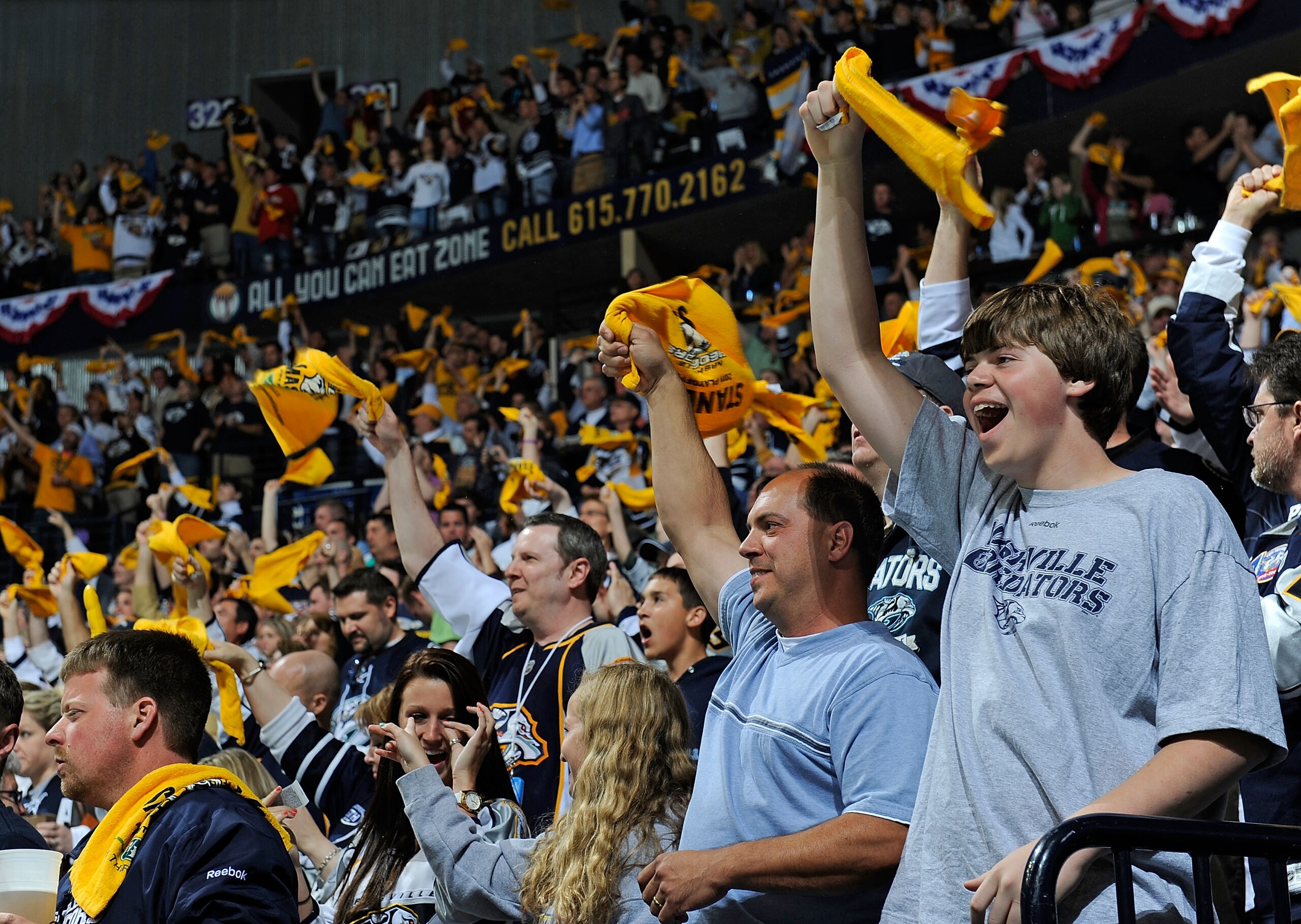 NASHVILLE, TN - APRIL 24:  Fans of the Nashville Predators cheer during a timeout in a game against the Anaheim Ducks in Game Six of the Western Conference Quarterfinals during the 2011 NHL Stanley Cup Playoffs at Bridgestone Arena on April 24, 2011 in Na