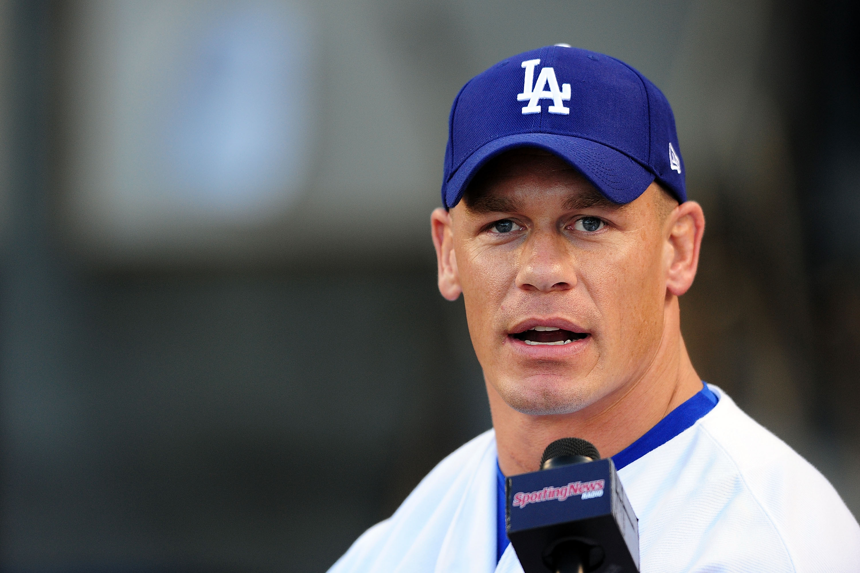 LOS ANGELES, CA - AUGUST 20:  WWE Superstar John Cena throws the ceremonial first pitch for the Los Angeles Dodgers as they play the Chicago Cubs on August 20, 2009 at Dodger Stadium in Los Angeles, California.  (Photo by Jacob de Golish/Getty Images)