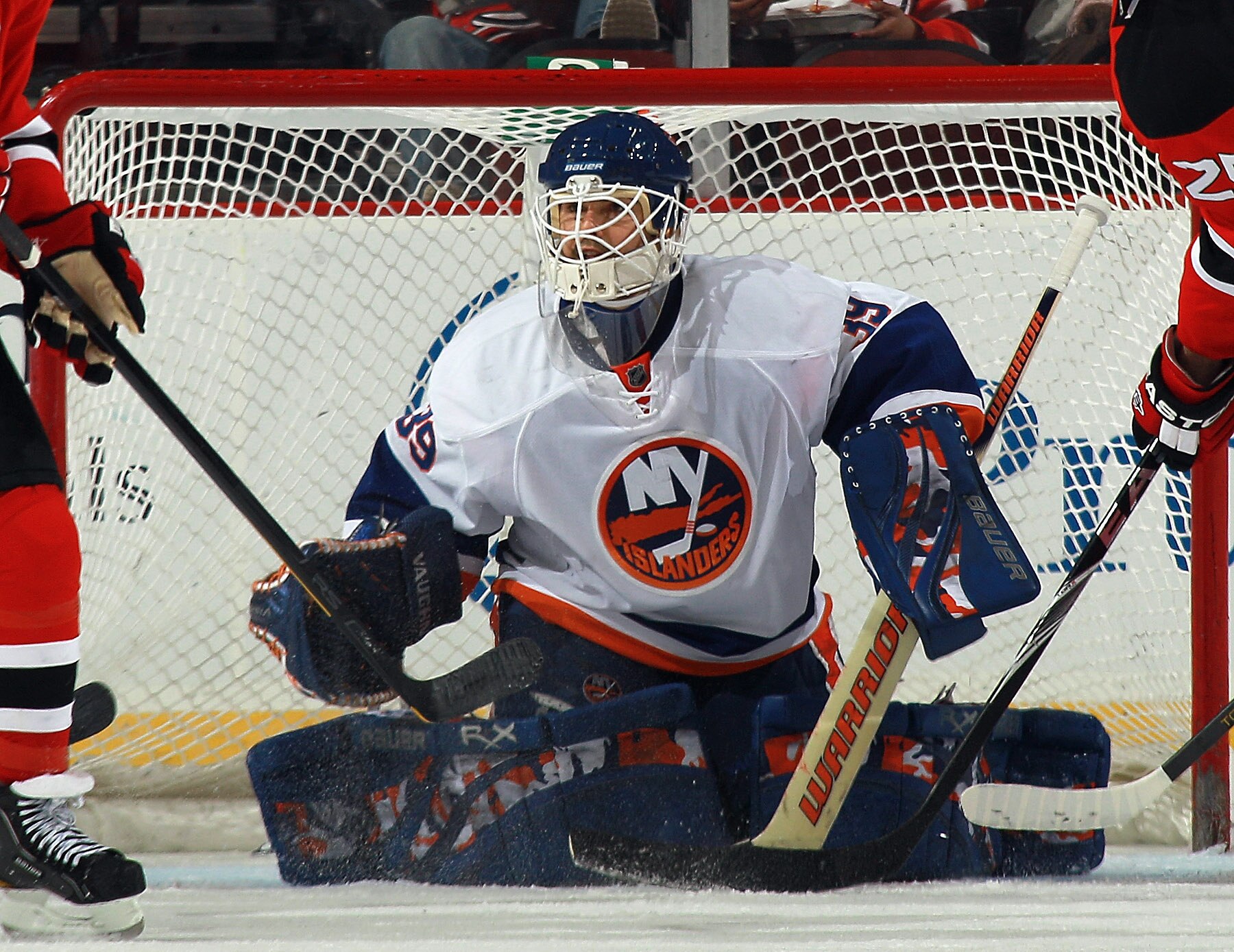 NEWARK, NJ - MARCH 30:  Rick DiPietro #39 of the New York Islanders tends net against the New Jersey Devils at the Prudential Center on March 30, 2011 in Newark, New Jersey. The Devils defeated the Islanders 3-2.  (Photo by Bruce Bennett/Getty Images)