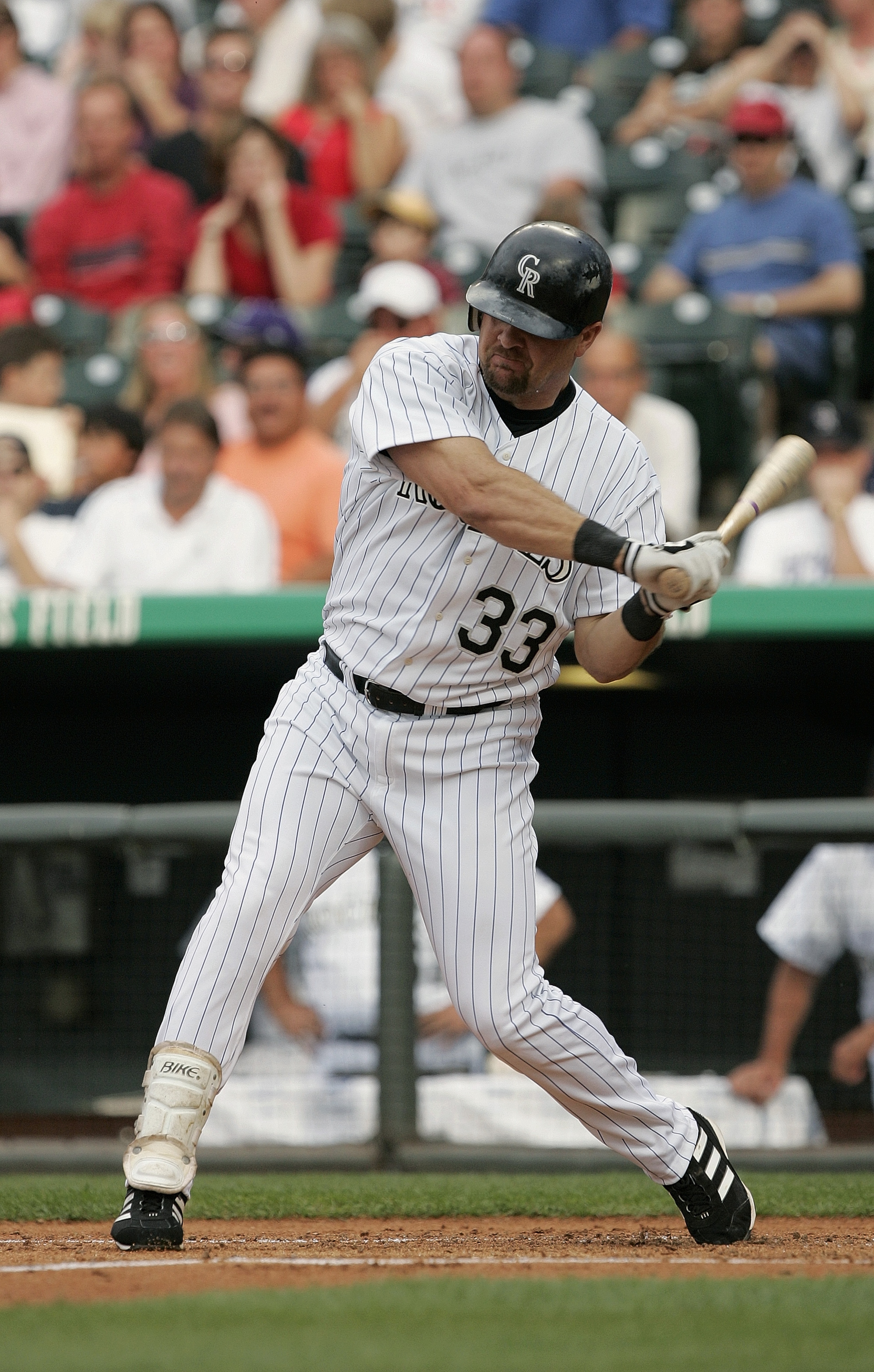 DENVER - JULY 3: Outfielder Larry Walker #33 of the Colorado Rockies swings at a Detroit Tigers pitch during the interleague game at Coors Field on July 3, 2004 in Denver, Colorado. The Rockies defeated the Tigers 11-6. (Photo by Brian Bahr/Getty Image DENVER - JULY 3: Outfielder Larry Walker #33 of the Colorado Rockies swings at a Detroit Tigers pitch during the interleague game at Coors Field on July 3, 2004 in Denver, Colorado. The Rockies defeated the Tigers 11-6. (Photo by Brian Bahr/Getty Image