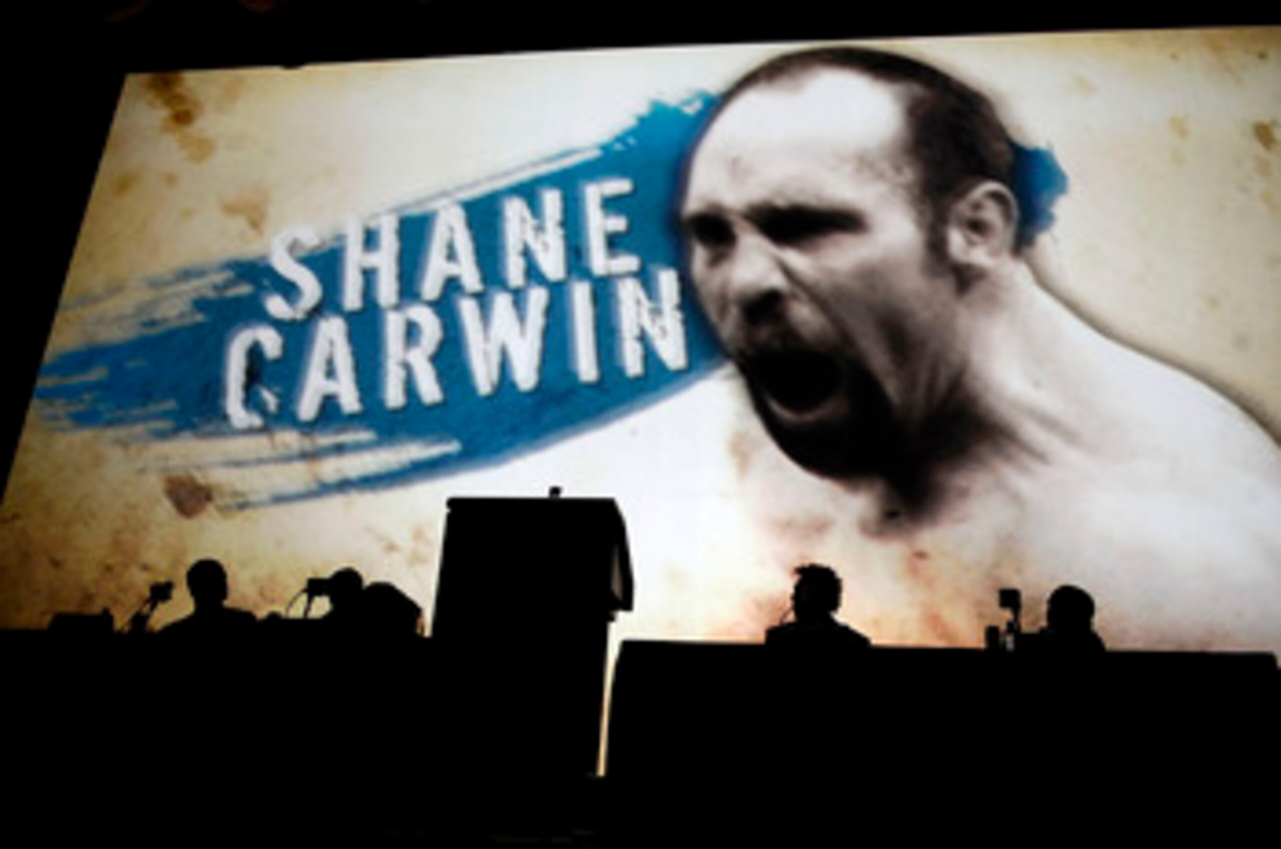 NEW YORK - MARCH 24:  UFC fighter Shane Carwin of Denver, Colorado appears on a giant screen at a press conference for UFC 111 at Radio City Music Hall on March 24, 2010 in New York City.  The fights will be held in Newark, New Jersey and fans will be abl