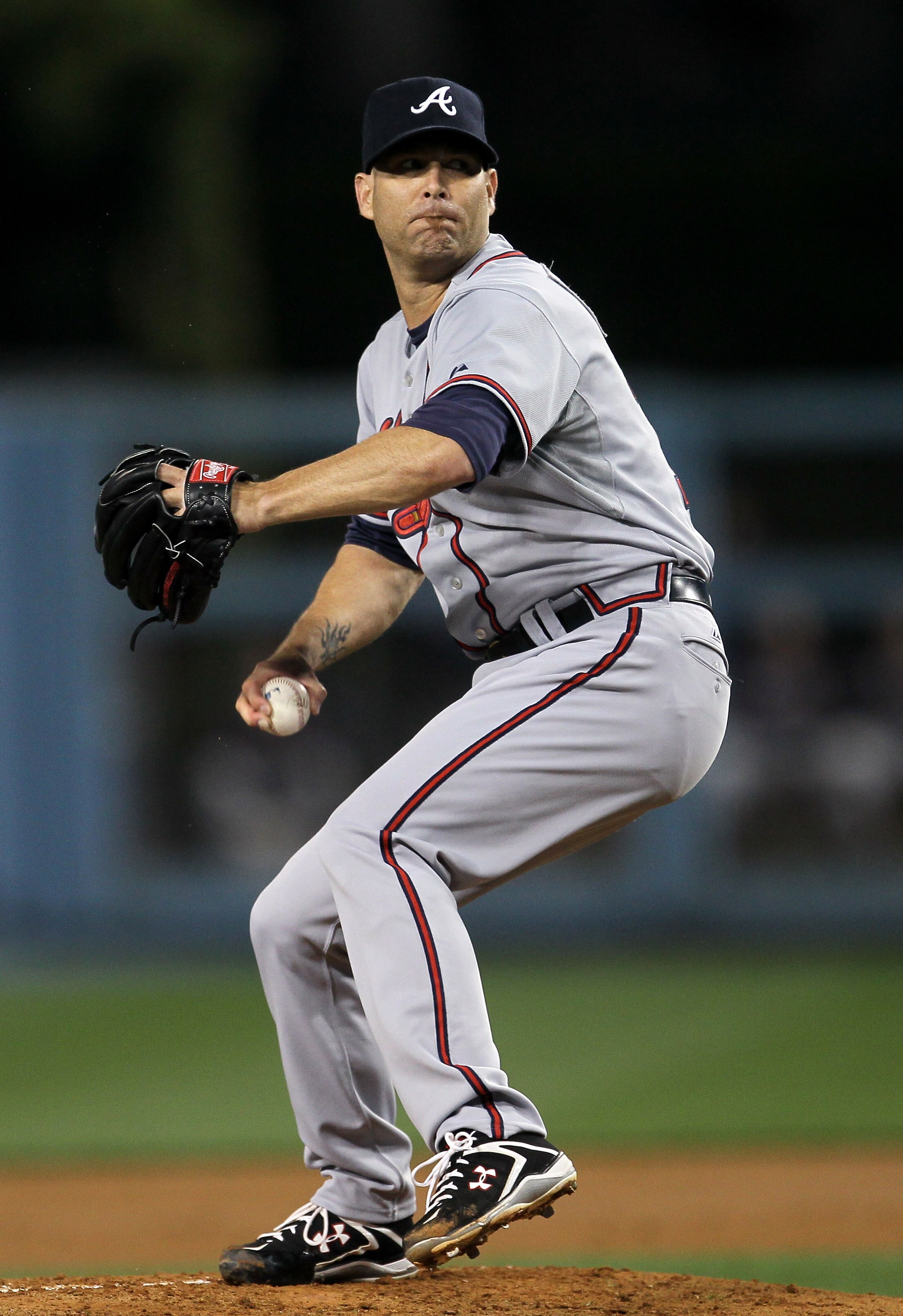 LOS ANGELES, CA - APRIL 18:  Tim Hudson #15 of the Atlanta Braves throws a pitch against the Los Angeles Dodgers on April 18, 2011 at Dodger Stadium in Los Angeles, California.  (Photo by Stephen Dunn/Getty Images)