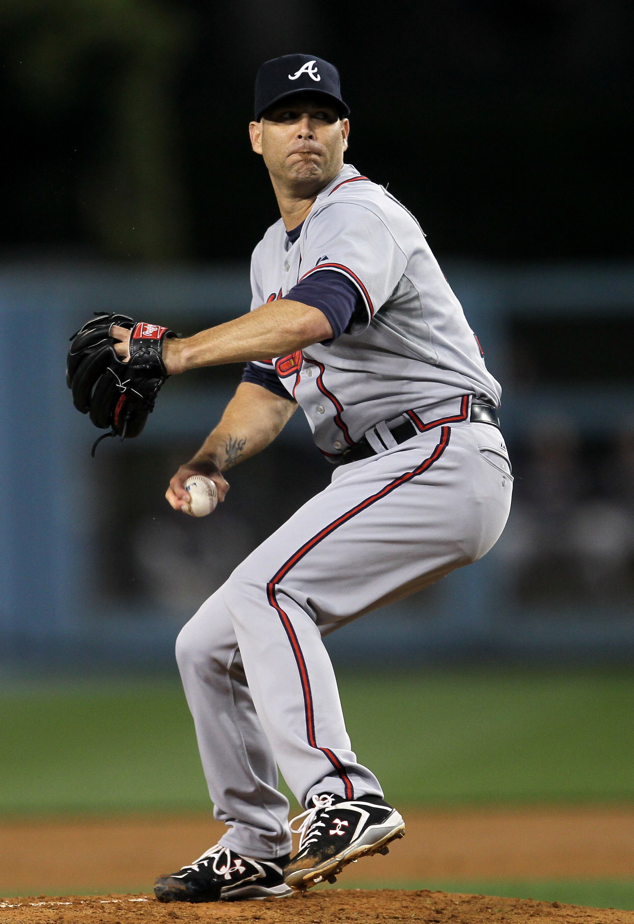 LOS ANGELES, CA - APRIL 18:  Tim Hudson #15 of the Atlanta Braves throws a pitch against the Los Angeles Dodgers on April 18, 2011 at Dodger Stadium in Los Angeles, California.  (Photo by Stephen Dunn/Getty Images)