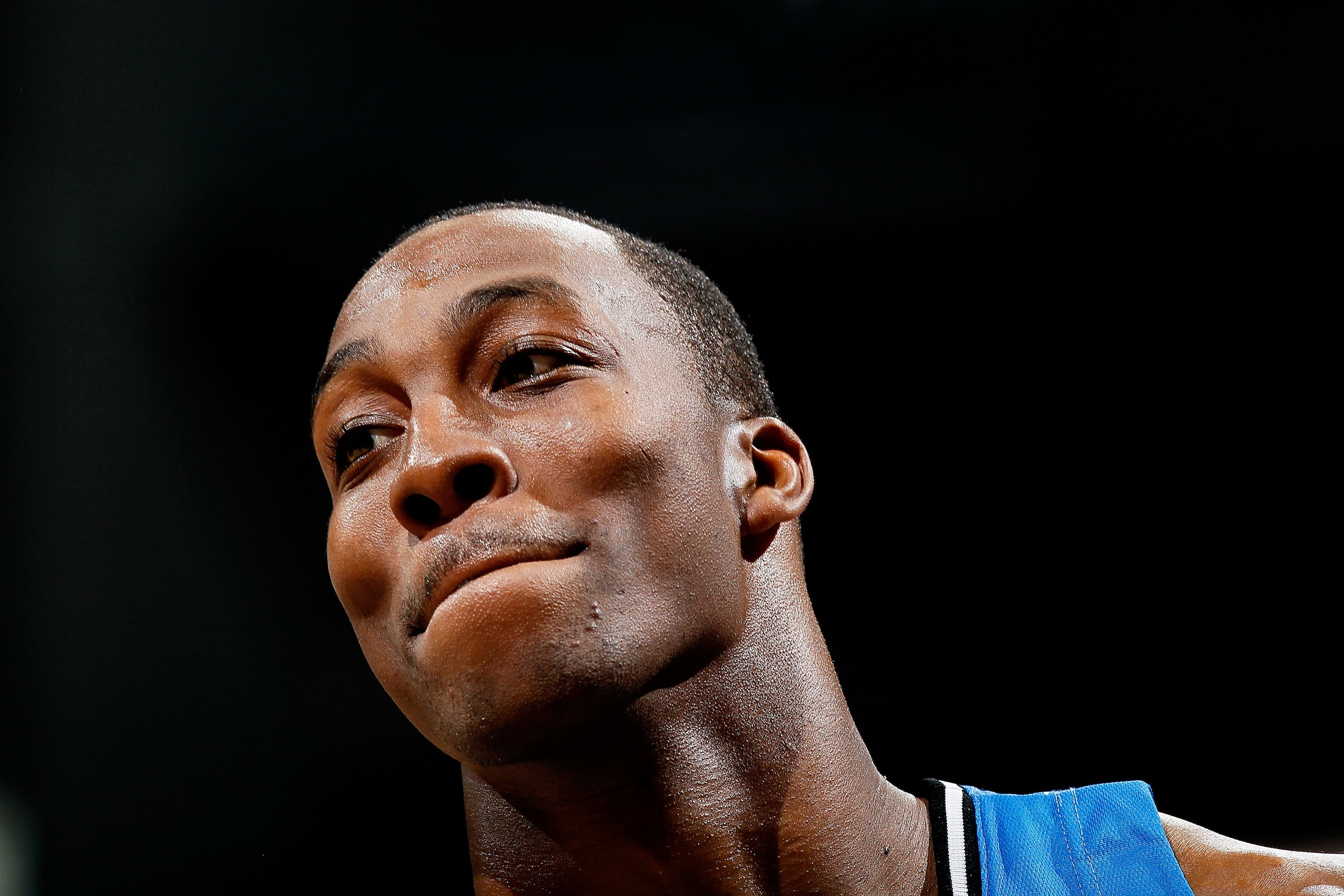 ATLANTA - MAY 08:  Dwight Howard #12 of the Orlando Magic smiles during a timeout against the Atlanta Hawks during Game Three of the Eastern Conference Semifinals during the 2010 NBA Playoffs at Philips Arena on May 8, 2010 in Atlanta, Georgia.  NOTE TO U