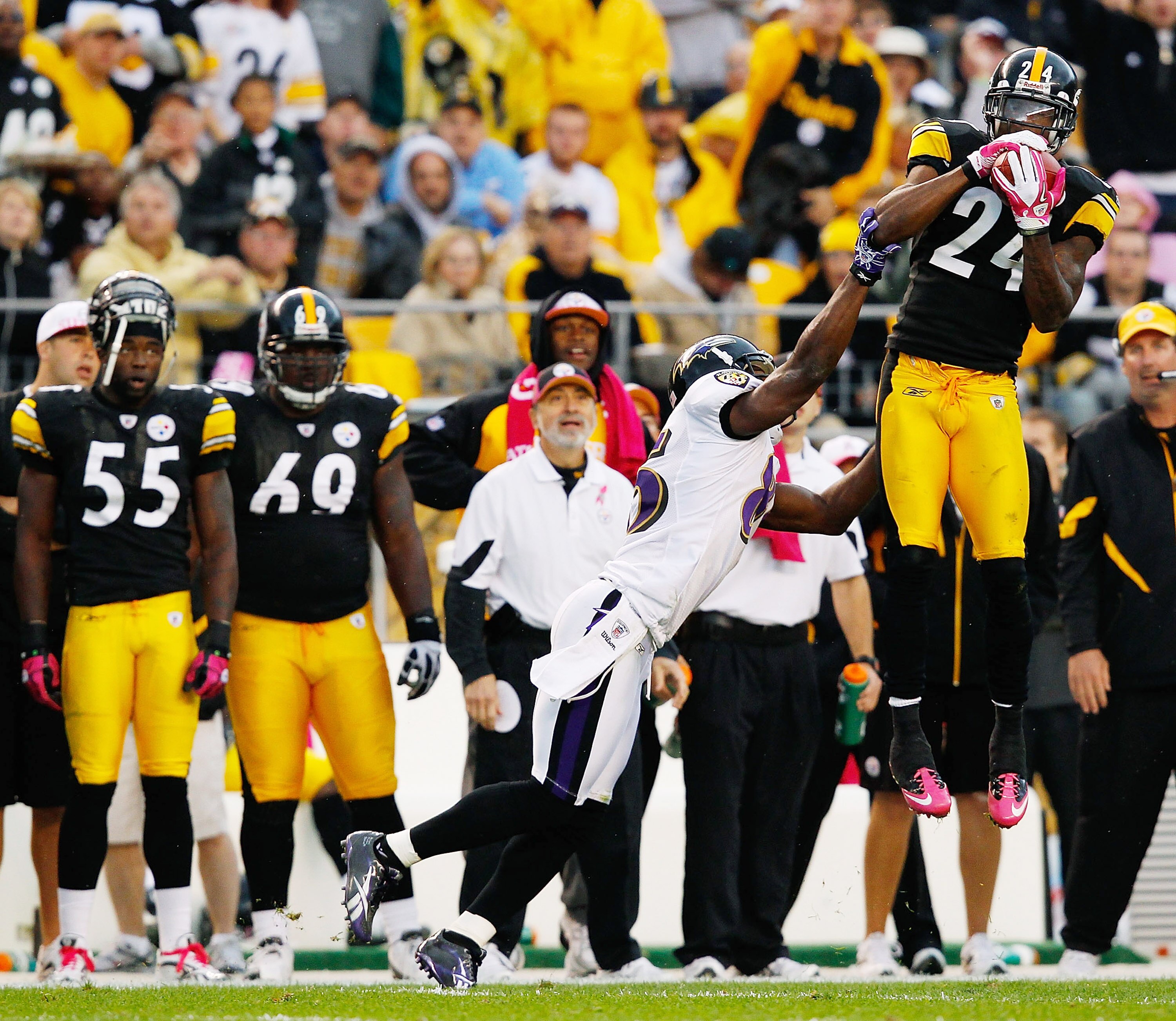 PITTSBURGH - OCTOBER 03:  Ike Taylor #24 of the Pittsburgh Steelers intercepts a pass from Joe Flacco #5 in front of Derrick Mason #85 of the Baltimore Ravens during the game on October 3, 2010 at Heinz Field in Pittsburgh, Pennsylvania.  (Photo by Jared