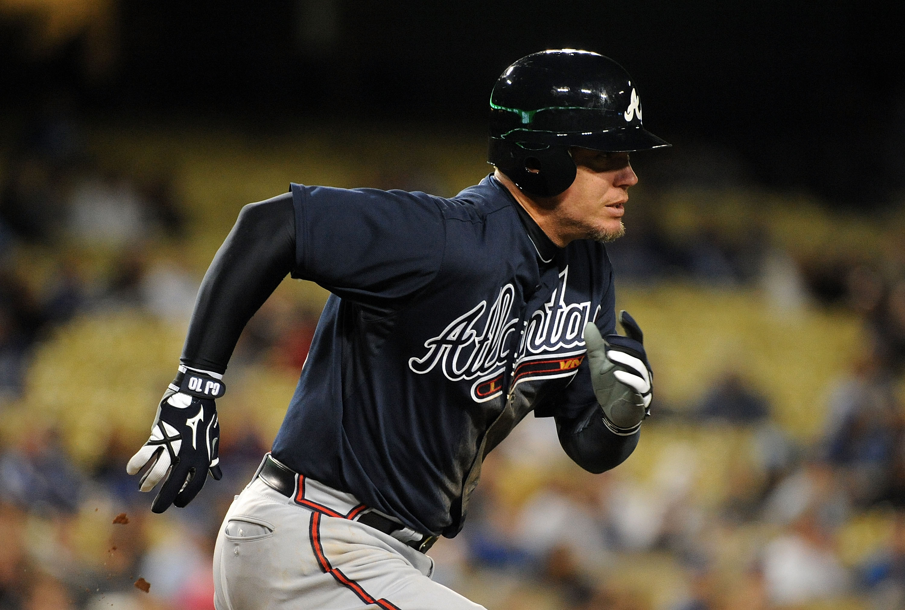 LOS ANGELES, CA - APRIL 20:  Chipper Jones #10 of the Atlanta Braves runs to first base against the Los Angeles Dodgers at Dodger Stadium on April 20, 2011 in Los Angeles, California.  (Photo by Lisa Blumenfeld/Getty Images)