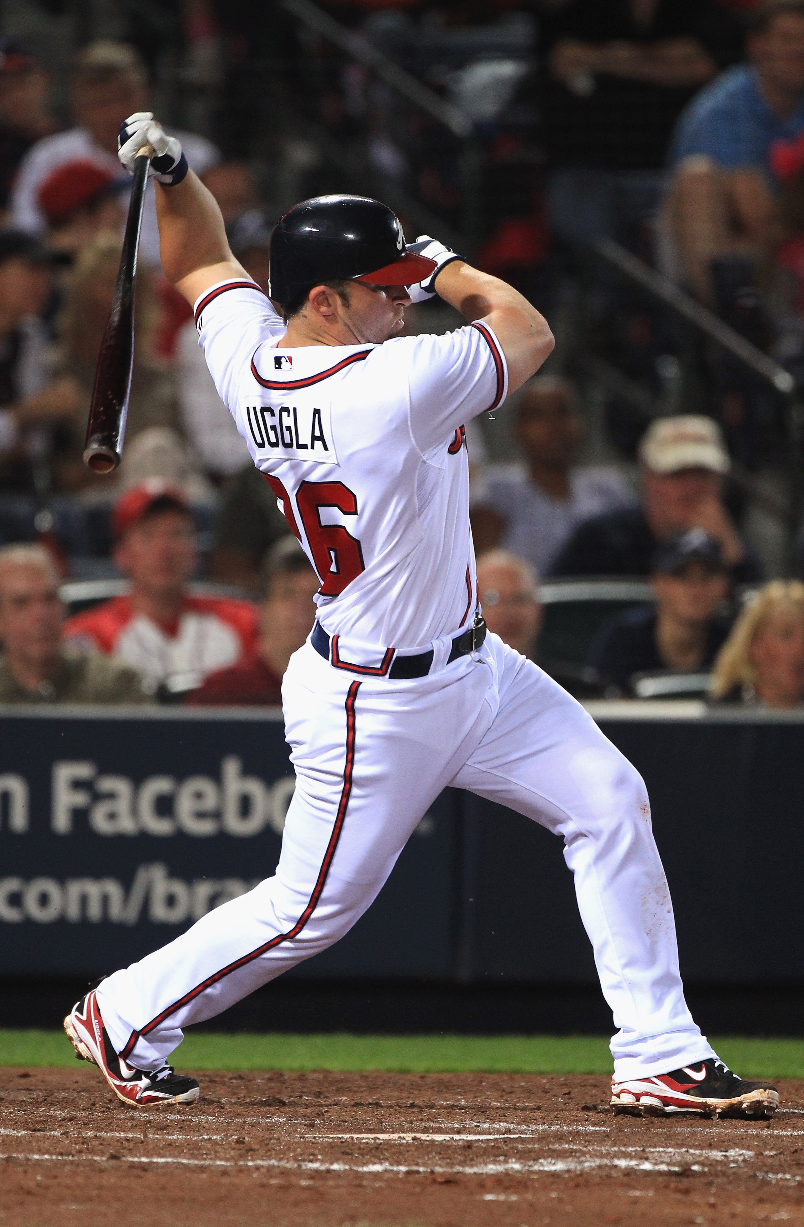 ATLANTA, GA - APRIL 08:  Dan Uggla #26 of the Atlanta Braves during their opening day game against the Philadelphia Phillies at Turner Field on April 8, 2011 in Atlanta, Georgia.  (Photo by Streeter Lecka/Getty Images)