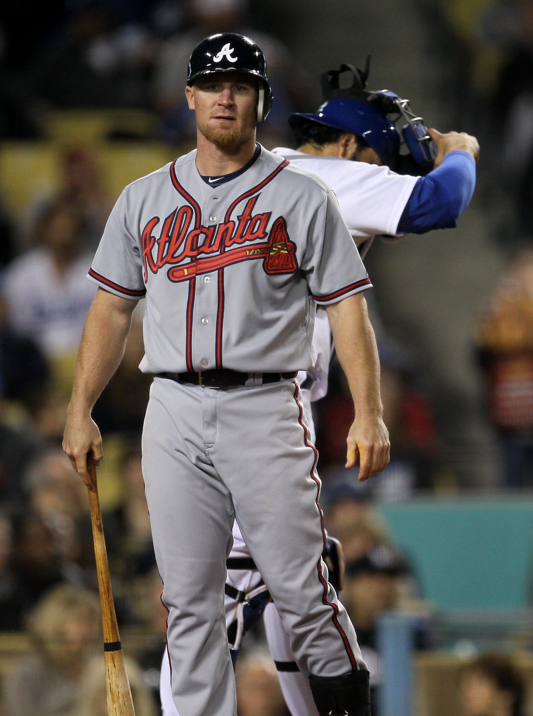 LOS ANGELES - APRIL 18:  Pinch hitter Brooks Conrad #7 of the Atlanta Braves reacts after striking out to end the seventh inning against the Los Angeles Dodgers on April 18, 2011 at Dodger Stadium in Los Angeles, California.   (Photo by Stephen Dunn/Getty