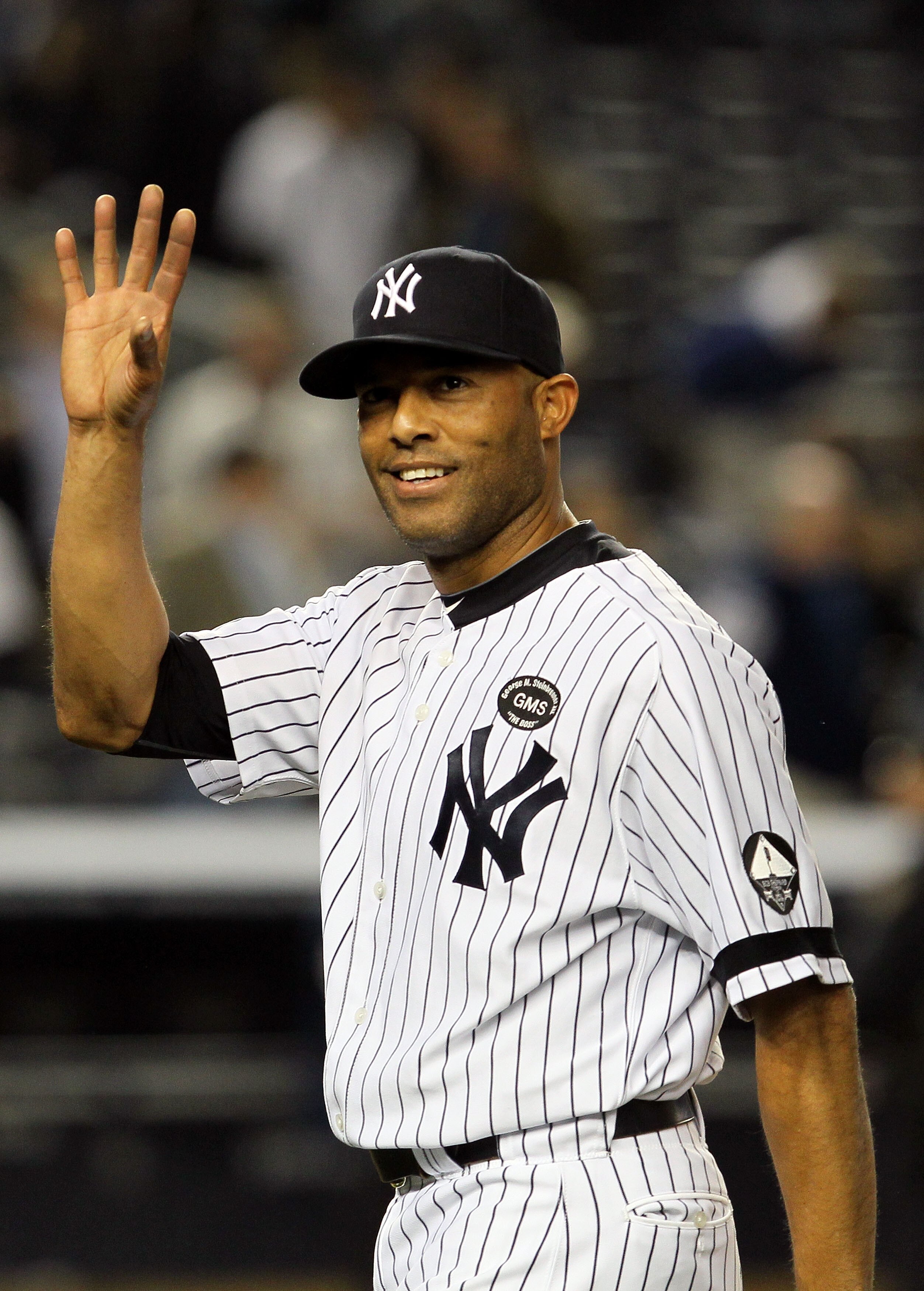 NEW YORK - OCTOBER 20:  Mariano Rivera #42 of the New York Yankees celebrates after the Yankees won 7-2 against the Texas Rangers in Game Five of the ALCS during the 2010 MLB Playoffs at Yankee Stadium on October 20, 2010 in the Bronx borough of New York