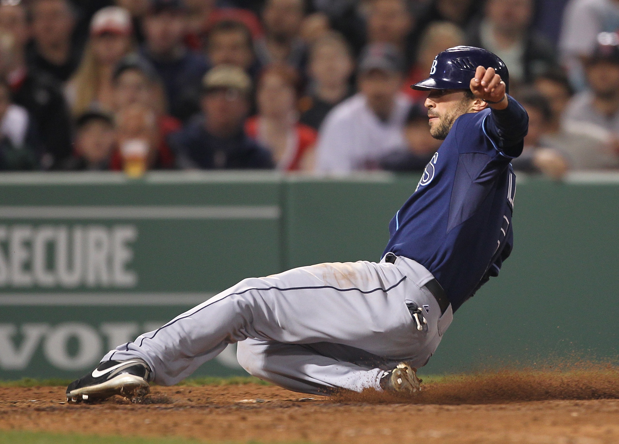 BOSTON, MA - APRIL 11: Sam Fuld #5 of the Tampa Bay Rays scores on a wild pitch against the Boston Red Sox at Fenway Park April 11, 2011 in Boston, Massachusetts. (Photo by Jim Rogash/Getty Images) BOSTON, MA - APRIL 11: Sam Fuld #5 of the Tampa Bay Rays scores on a wild pitch against the Boston Red Sox at Fenway Park April 11, 2011 in Boston, Massachusetts. (Photo by Jim Rogash/Getty Images)
