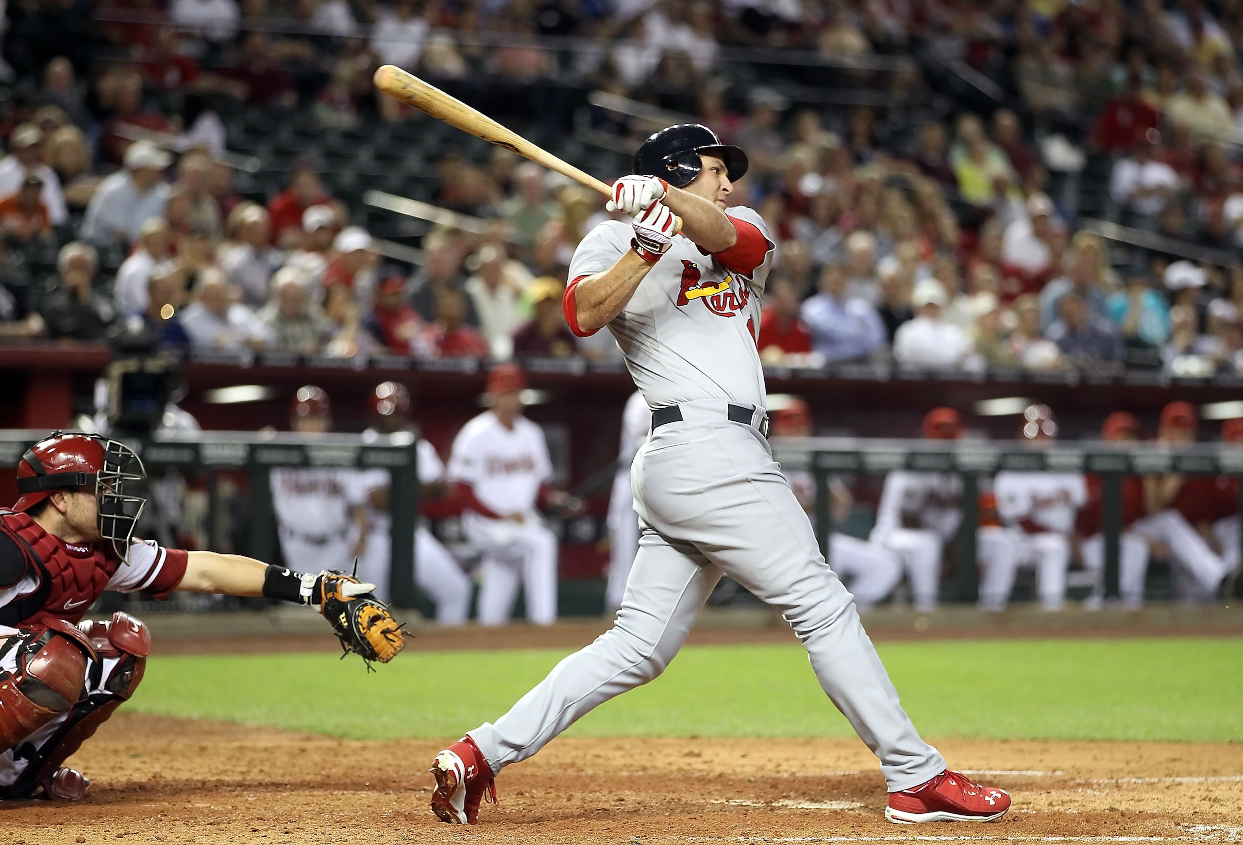 PHOENIX, AZ - APRIL 12: Lance Berkman #12 of the St. Louis Cardinals bats against the Arizona Diamondbacks during the Major League Baseball game at Chase Field on April 12, 2011 in Phoenix, Arizona. The Diamondbacks defeated the Cardinals 13-8. (Photo b PHOENIX, AZ - APRIL 12: Lance Berkman #12 of the St. Louis Cardinals bats against the Arizona Diamondbacks during the Major League Baseball game at Chase Field on April 12, 2011 in Phoenix, Arizona. The Diamondbacks defeated the Cardinals 13-8. (Photo b