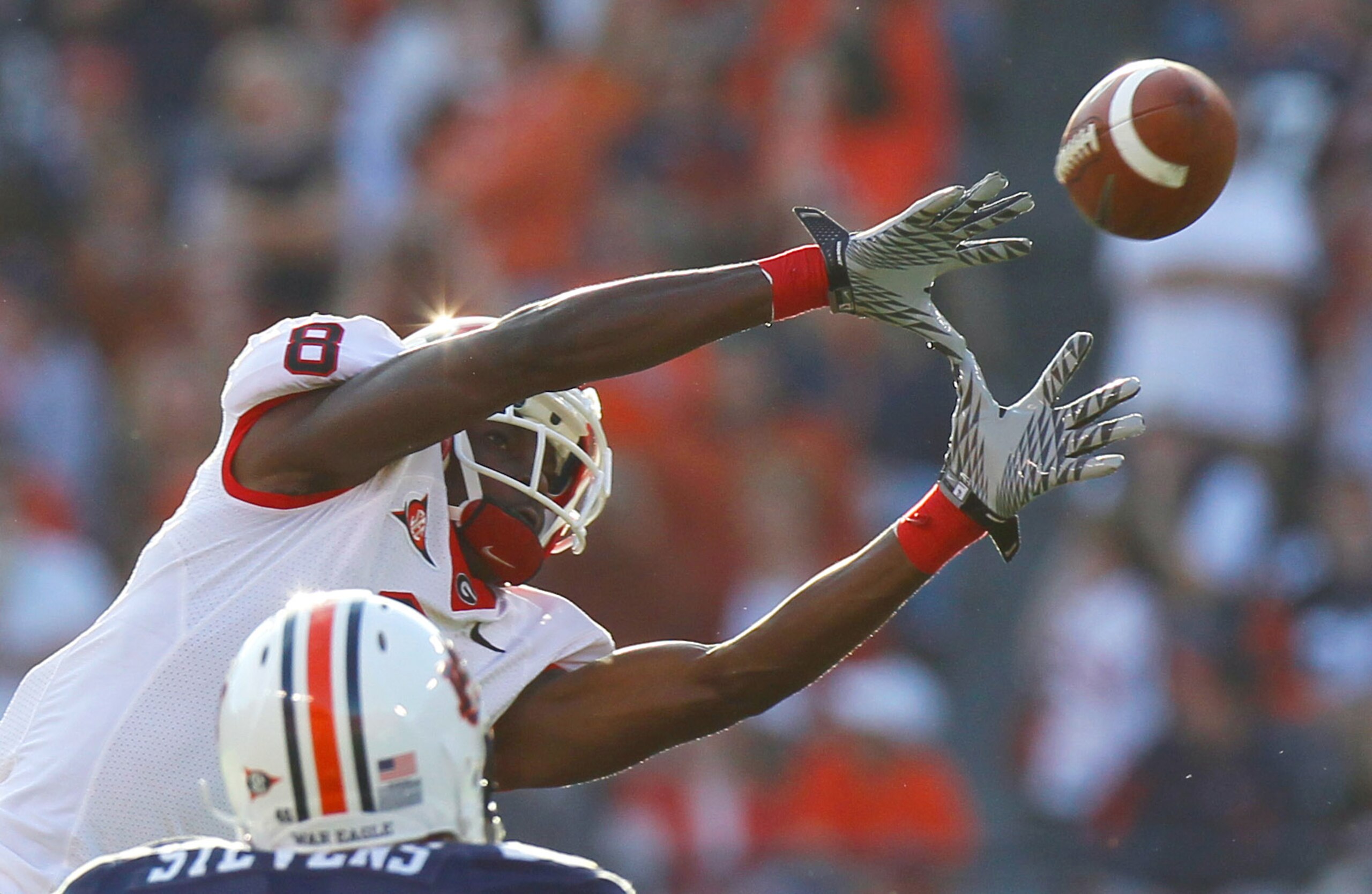 AUBURN, AL - NOVEMBER 13: A.J. Green #8 of the Georgia Bulldogs pulls in this reception against Craig Stevens #46 of the Auburn Tigers at Jordan-Hare Stadium on November 13, 2010 in Auburn, Alabama. (Photo by Kevin C. Cox/Getty Images) AUBURN, AL - NOVEMBER 13: A.J. Green #8 of the Georgia Bulldogs pulls in this reception against Craig Stevens #46 of the Auburn Tigers at Jordan-Hare Stadium on November 13, 2010 in Auburn, Alabama. (Photo by Kevin C. Cox/Getty Images)