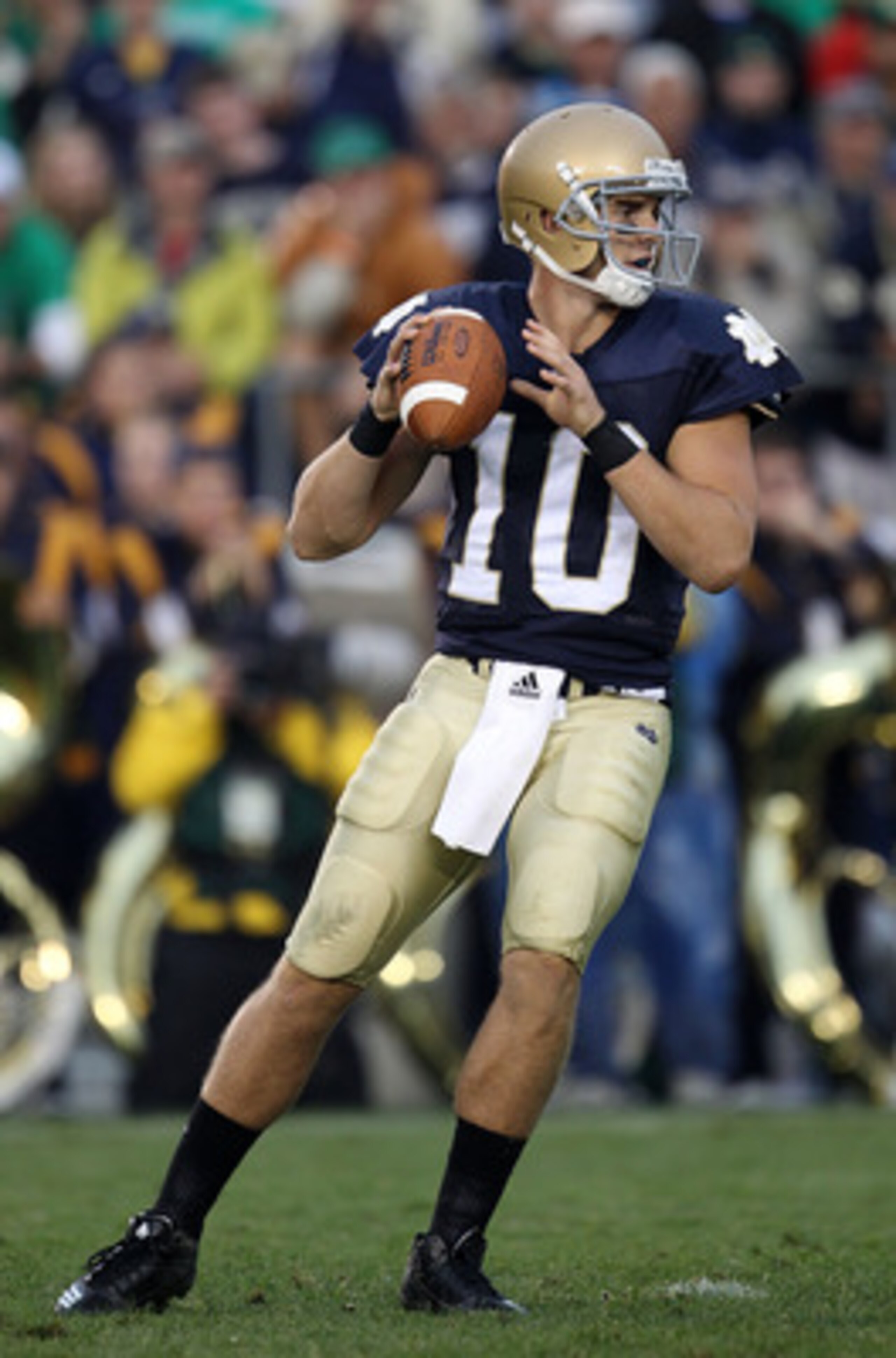 SOUTH BEND, IN - SEPTEMBER 11: Dayne Crist #10 of the Notre Dame Fighting Irish looks for a receiver in the 4th quarter against the Michigan Wolverines at Notre Dame Stadium on September 11, 2010 in South Bend, Indiana. Michigan defeated Notre Dame 28-24.