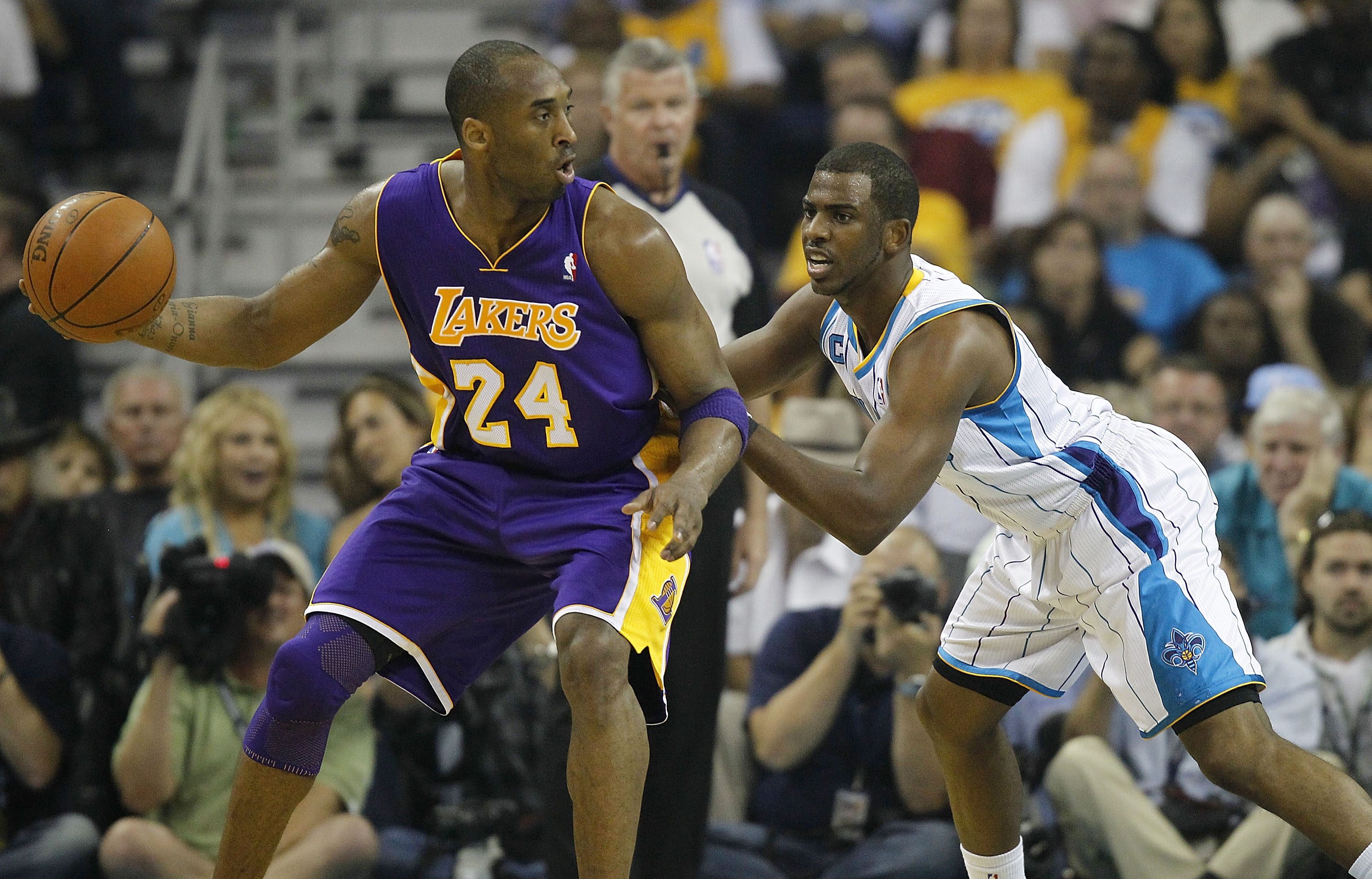 NEW ORLEANS - APRIL 24:  Chris Paul #3 of the New Orleans Hornets guards Kobe Bryant #24 of the Los Angeles Lakers in Game Four of the Western Conference Quarterfinals in the 2011 NBA Playoffs at New Orleans Arena on April 24, 2011 in New Orleans, Louisia