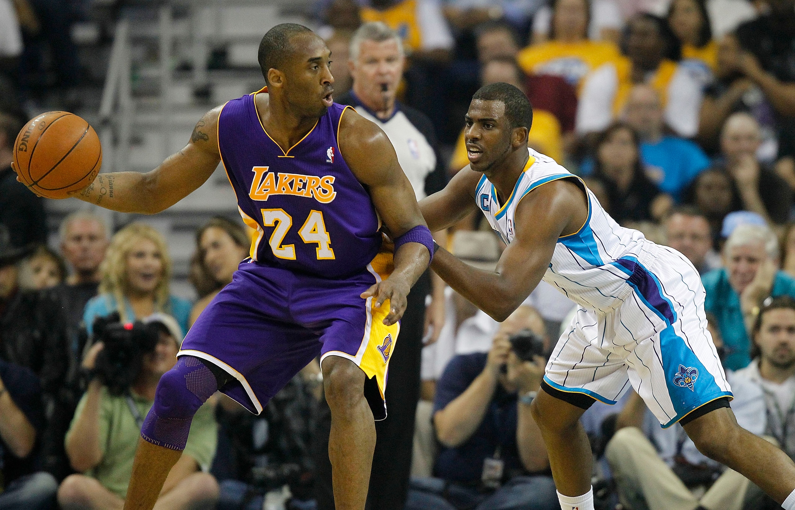 NEW ORLEANS - APRIL 24:  Chris Paul #3 of the New Orleans Hornets guards Kobe Bryant #24 of the Los Angeles Lakers in Game Four of the Western Conference Quarterfinals in the 2011 NBA Playoffs at New Orleans Arena on April 24, 2011 in New Orleans, Louisia