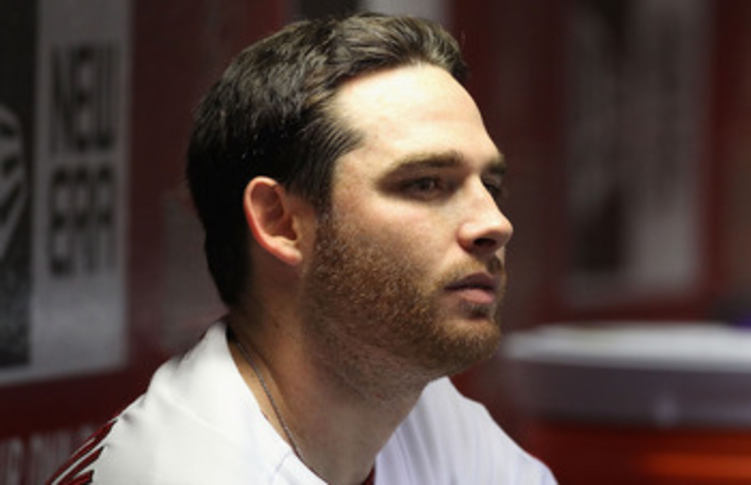 PHOENIX, AZ - APRIL 25:  Starting pitcher Ian Kennedy #31 of the Arizona Diamondbacks watches from the dugout during the Major League Baseball game against the Philadelphia Phillies at Chase Field on April 25, 2011 in Phoenix, Arizona.  The Diamondbacks d