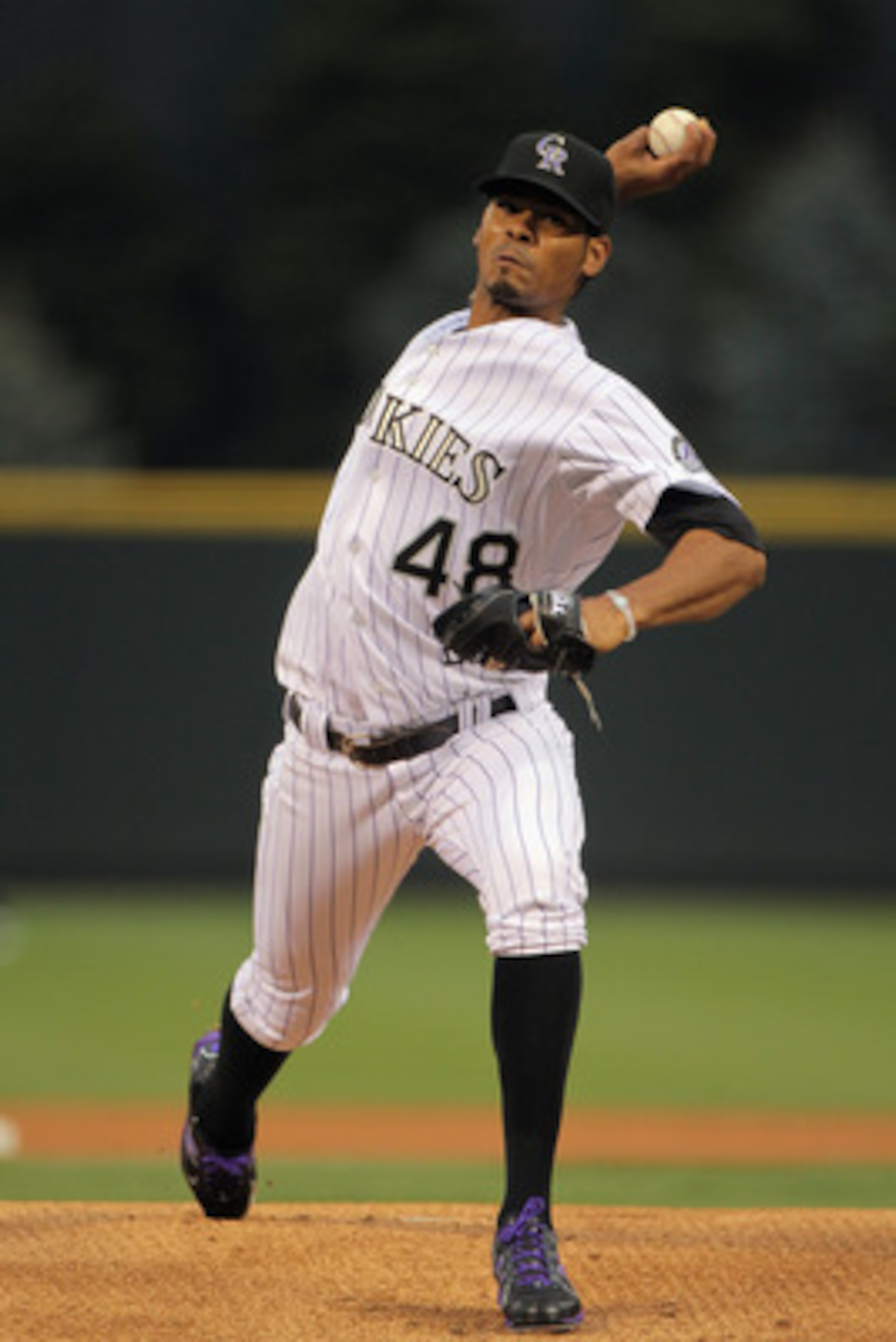 DENVER, CO - APRIL 18:  Starting pitcher Esmil Rogers #48 of the Colorado Rockies delivers against the San Francisco Giants at Coors Field on April 18, 2011 in Denver, Colorado. Rogers collected the loss as the Giants defeated the Rockies 8-1.  (Photo by 