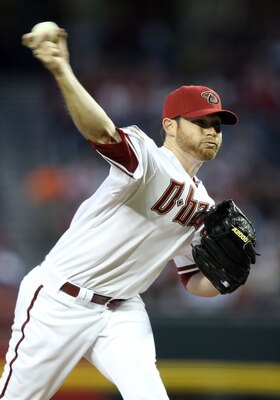 PHOENIX, AZ - APRIL 08:  Starting pitcher Ian Kennedy #31 of the Arizona Diamondbacks pitches against the Cincinnati Reds  during the Major League Baseball home opening game at Chase Field on April 8, 2011 in Phoenix, Arizona. The Diamondbacks defeated th