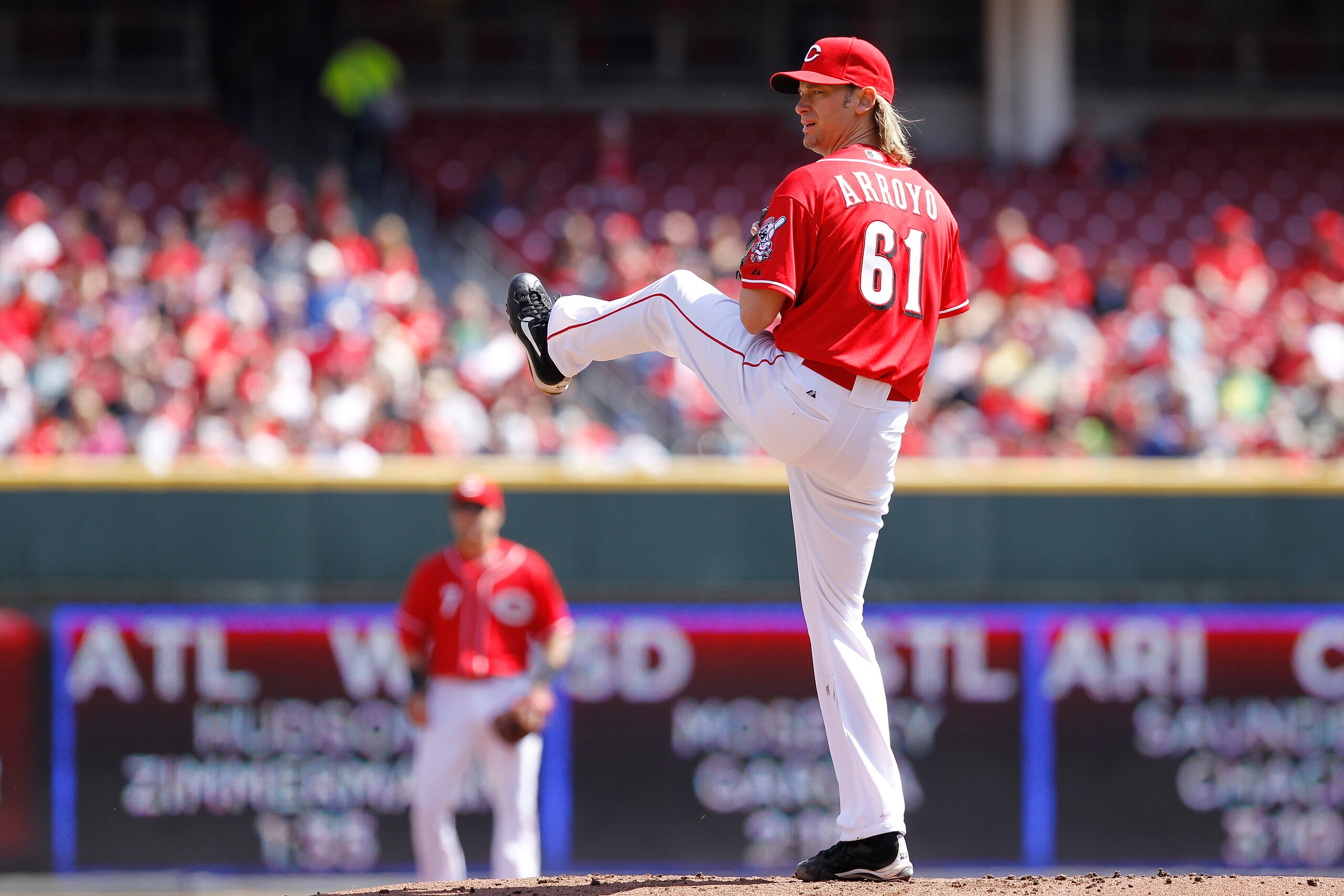 CINCINNATI, OH - APRIL 3: Bronson Arroyo #61 of the Cincinnati Reds pitches against the Milwaukee Brewers at Great American Ball Park on April 3, 2011 in Cincinnati, Ohio. The Reds won 12-3. (Photo by Joe Robbins/Getty Images)