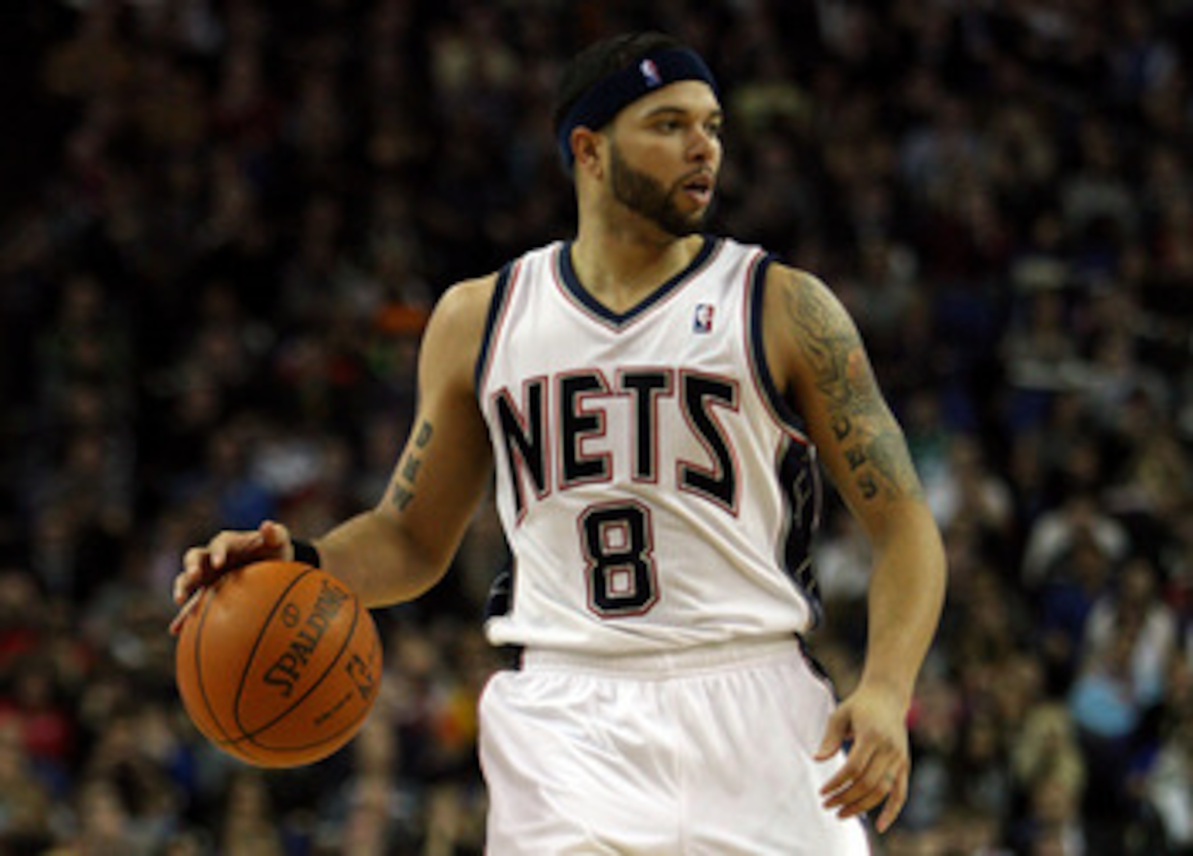 LONDON, ENGLAND - MARCH 04:  #8 Deron Williams of the Nets in action during the NBA match between New Jersey Nets and the Toronto Raptors at the O2 Arena on March 4, 2011 in London, England. NOTE TO USER: User expressly acknowledges and agrees that, by do