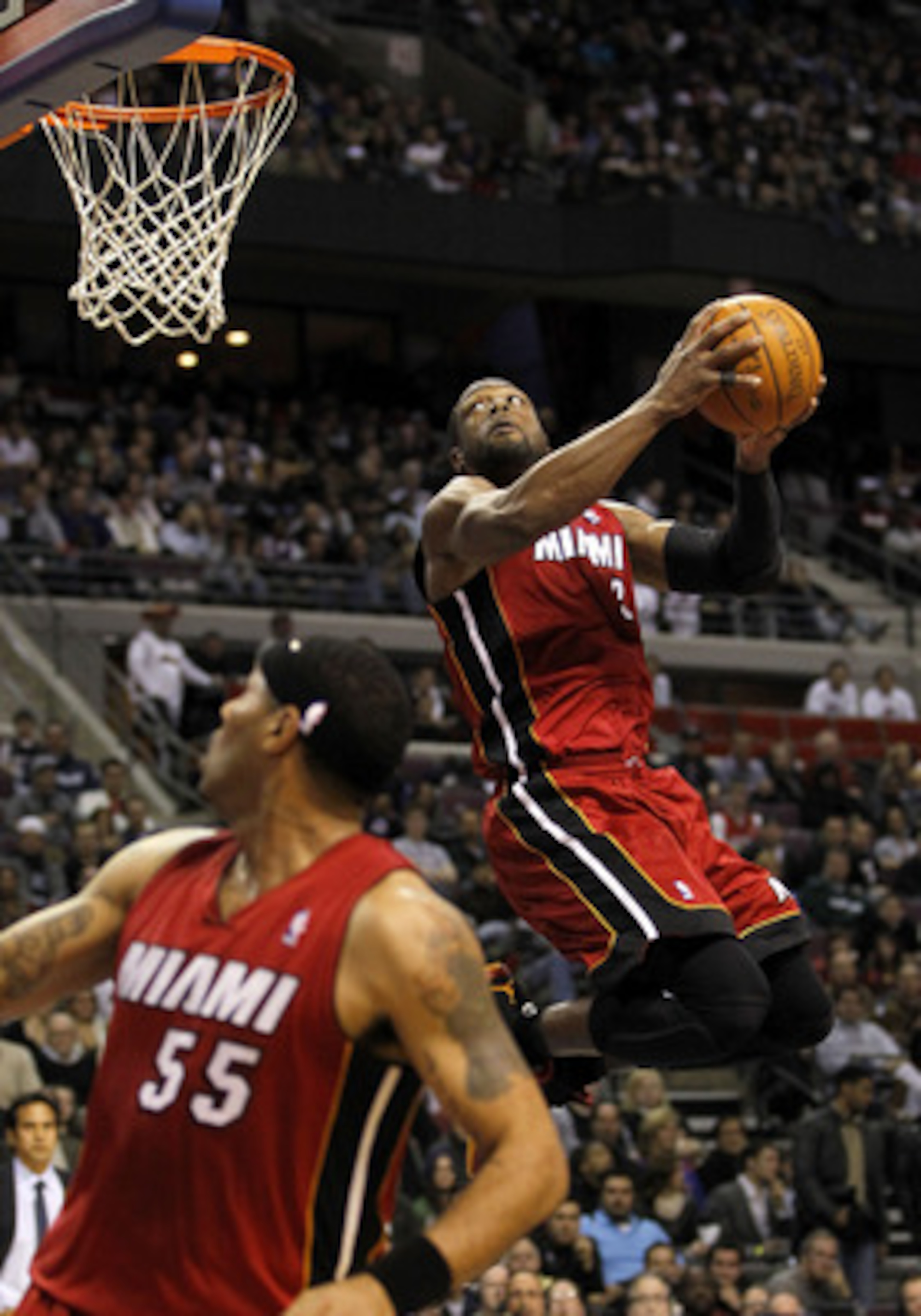 AUBURN HILLS, MI - MARCH 23: Dwyane Wade #3 of the Miami Heat gets in for a dunk while playing the Detroit Pistons at The Palace of Auburn Hills on March 23, 2011 in Auburn Hills, Michigan. NOTE TO USER: User expressly acknowledges and agrees that, by dow