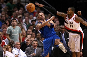 PORTLAND, OR - APRIL 23:  LaMarcus Aldridge #12 of the Portland Trail Blazers defends Jason Kidd #2 of the Dallas Mavericks in Game Four of the Western Conference Quarterfinals in the 2011 NBA Playoffs on April 23, 2011 at the Rose Garden in Portland, Ore