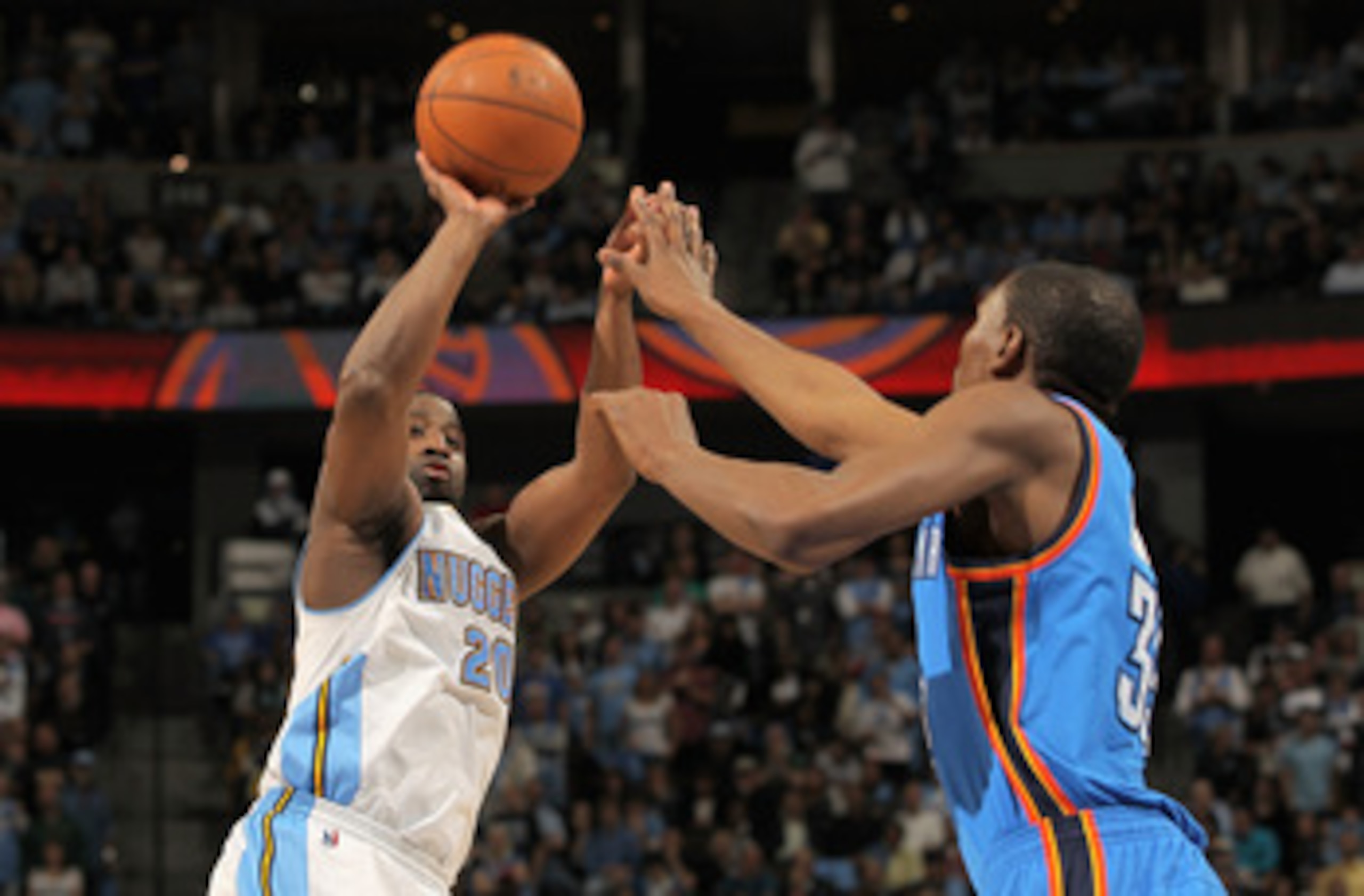 DENVER, CO - APRIL 25:  Raymond Felton #20 of the Denver Nuggets takes a shot over Kevin Durant #35 of the Oklahoma City Thunder in Game Four of the Western Conference Quarterfinals in the 2011 NBA Playoffs on April 24, 2011 at the Pepsi Center in Denver,