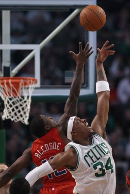 BOSTON, MA - MARCH 09:  Paul Pierce #34 of the Boston Celtics and Eric Bledsoe #12 of the Los Angeles Clippers jump for the ball on March 9, 2011 at the TD Garden in Boston, Massachusetts. The Los Angeles Clippers defeated the Boston Celtics 108-103. NOTE
