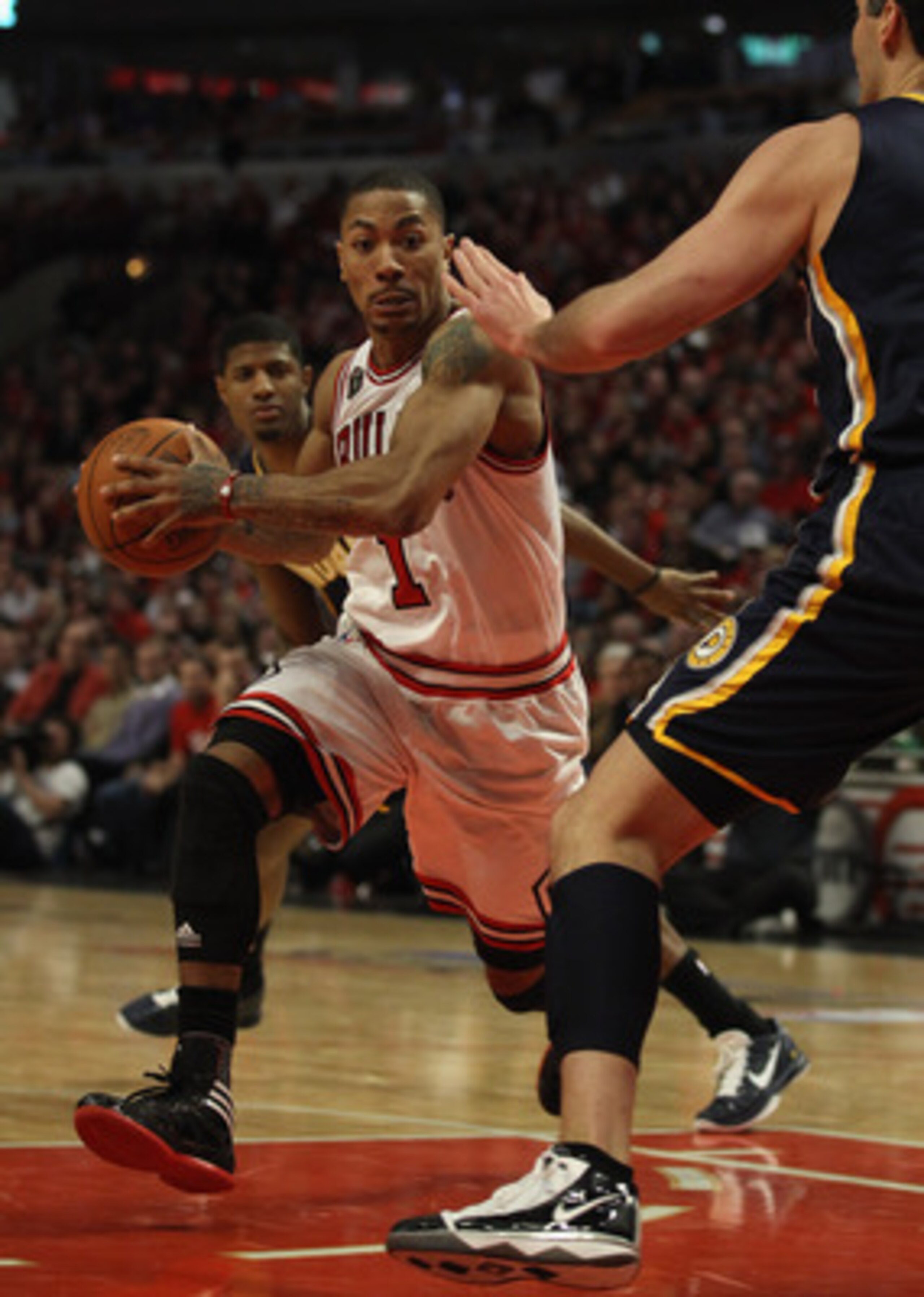 CHICAGO, IL - APRIL 18: Derrick Rose #1 of the Chicago Bulls moves against Jeff Foster #10 of the Indiana Pacers in Game Two of the Eastern Conference Quarterfinals in the 2011 NBA Playoffs at the United Center on April 18, 2011 in Chicago, Illinois. The