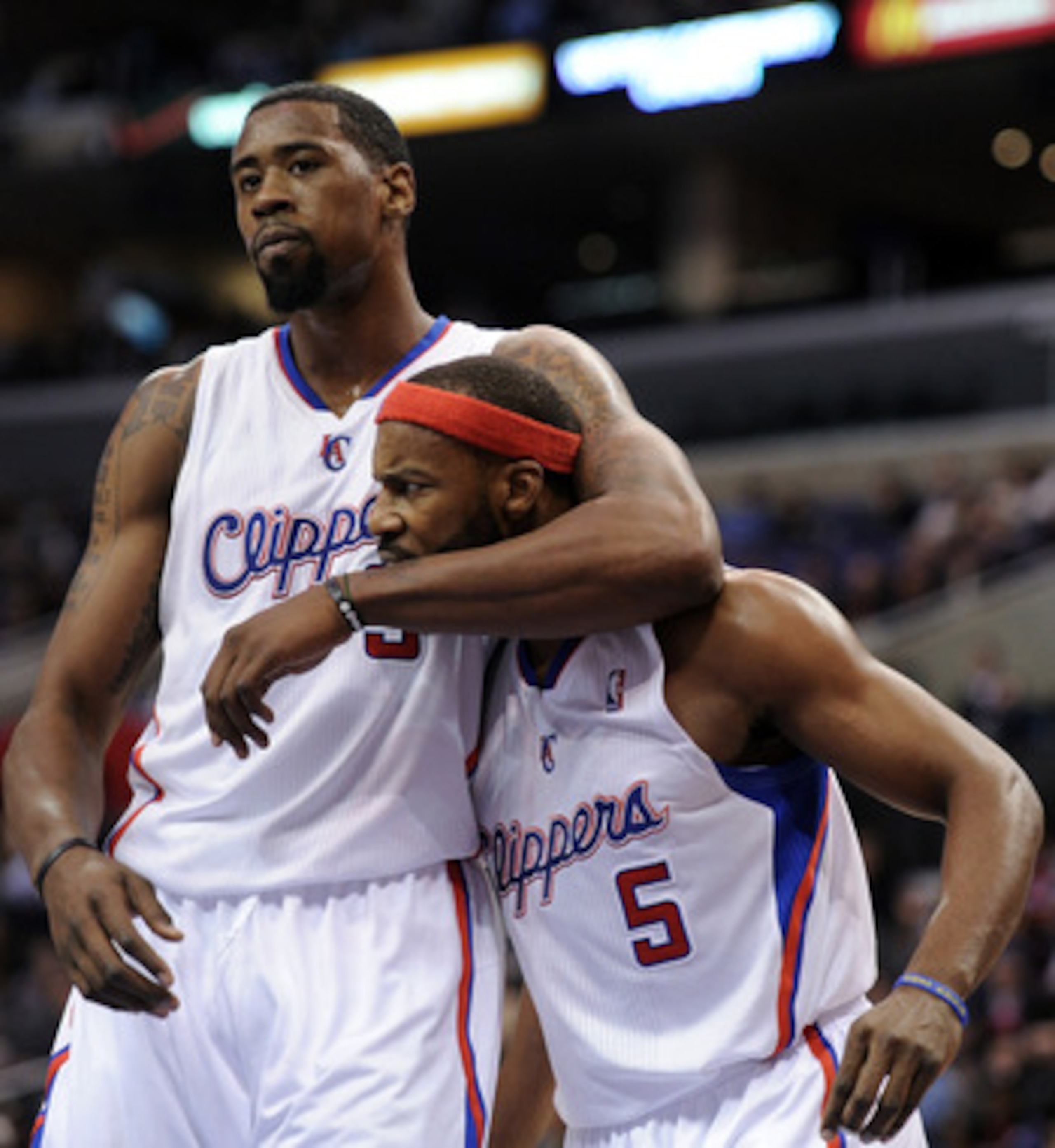 LOS ANGELES, CA - DECEMBER 01:  Baron Davis #5 and DeAndre Jordan #9 of the Los Angeles Clippers reacts after a defensive stop against the San Antonio Spurs during a 90-85 Clipper win at the Staples Center on December 1, 2010 in Los Angeles, California.  