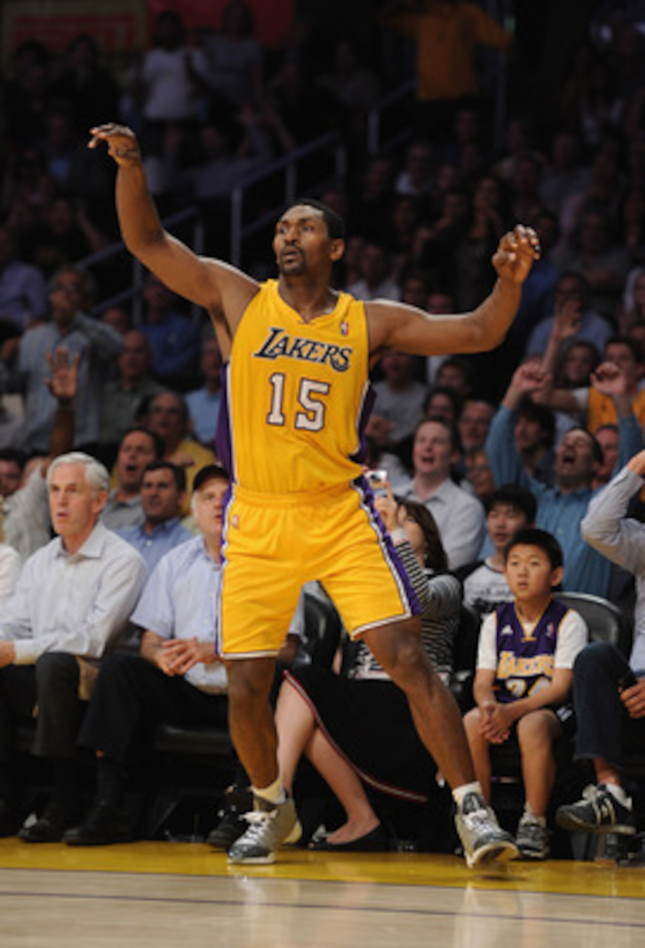 LOS ANGELES, CA - MARCH 31:  Ron Artests #15 of the Los Angeles Lakers watches his three point attempt at Staples Center on March 31, 2011 in Los Angeles, California.  NOTE TO USER: User expressly acknowledges and agrees that, by downloading and or using