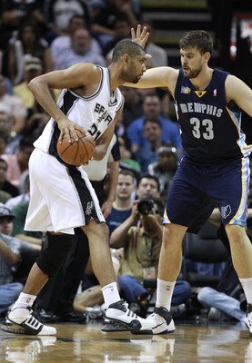 SAN ANTONIO, TX - APRIL 27: Marc Gasol #33 of the Memphis Grizzlies defends against Tim Duncan #21 of the San Antionio Spurs in Game Five of the Western Conference Quarterfinals in the 2011 NBA Playoffs on April 27, 2011 at AT&T Center in San Antonio, Tex