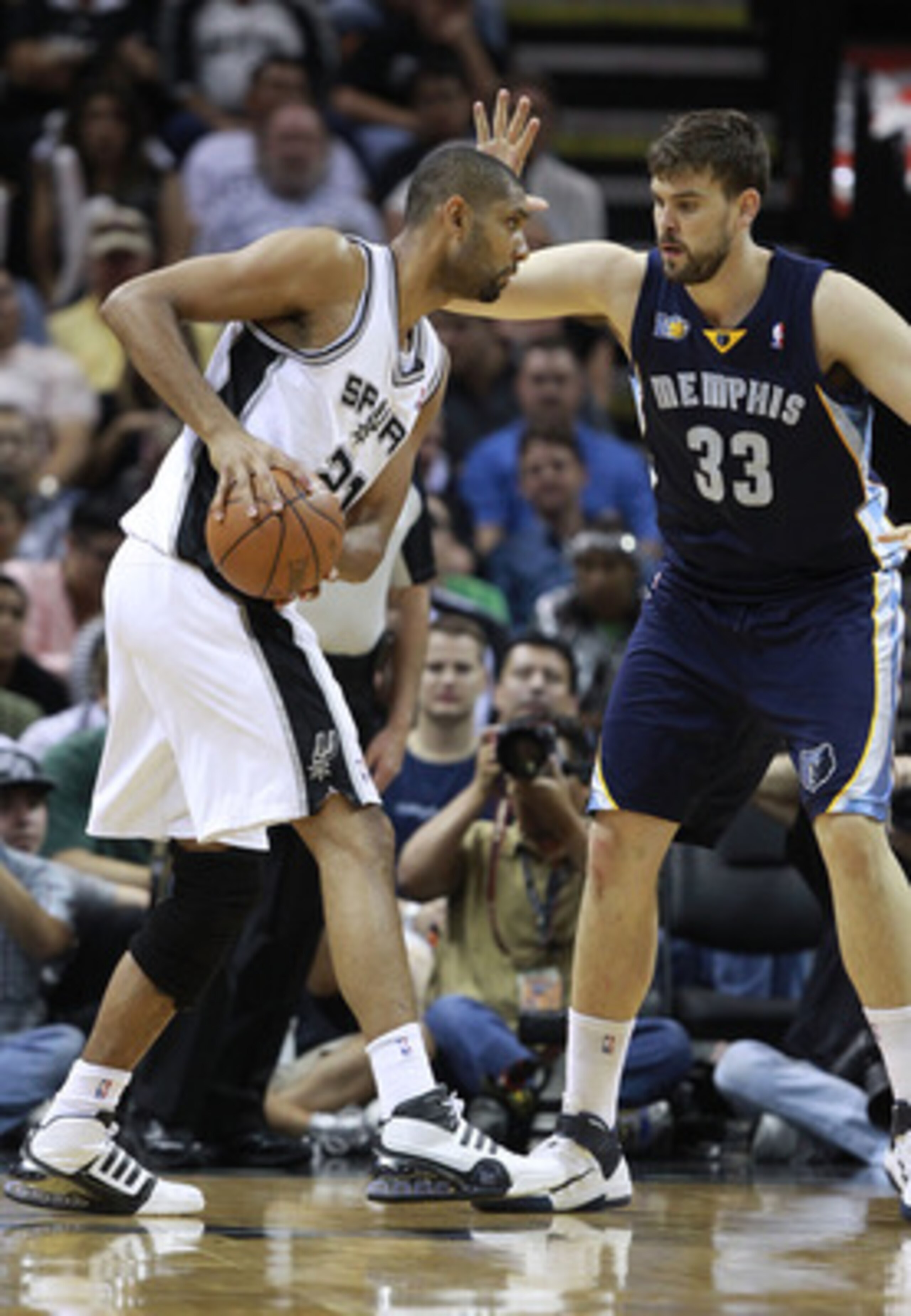 SAN ANTONIO, TX - APRIL 27: Marc Gasol #33 of the Memphis Grizzlies defends against Tim Duncan #21 of the San Antionio Spurs in Game Five of the Western Conference Quarterfinals in the 2011 NBA Playoffs on April 27, 2011 at AT&T Center in San Antonio, Tex