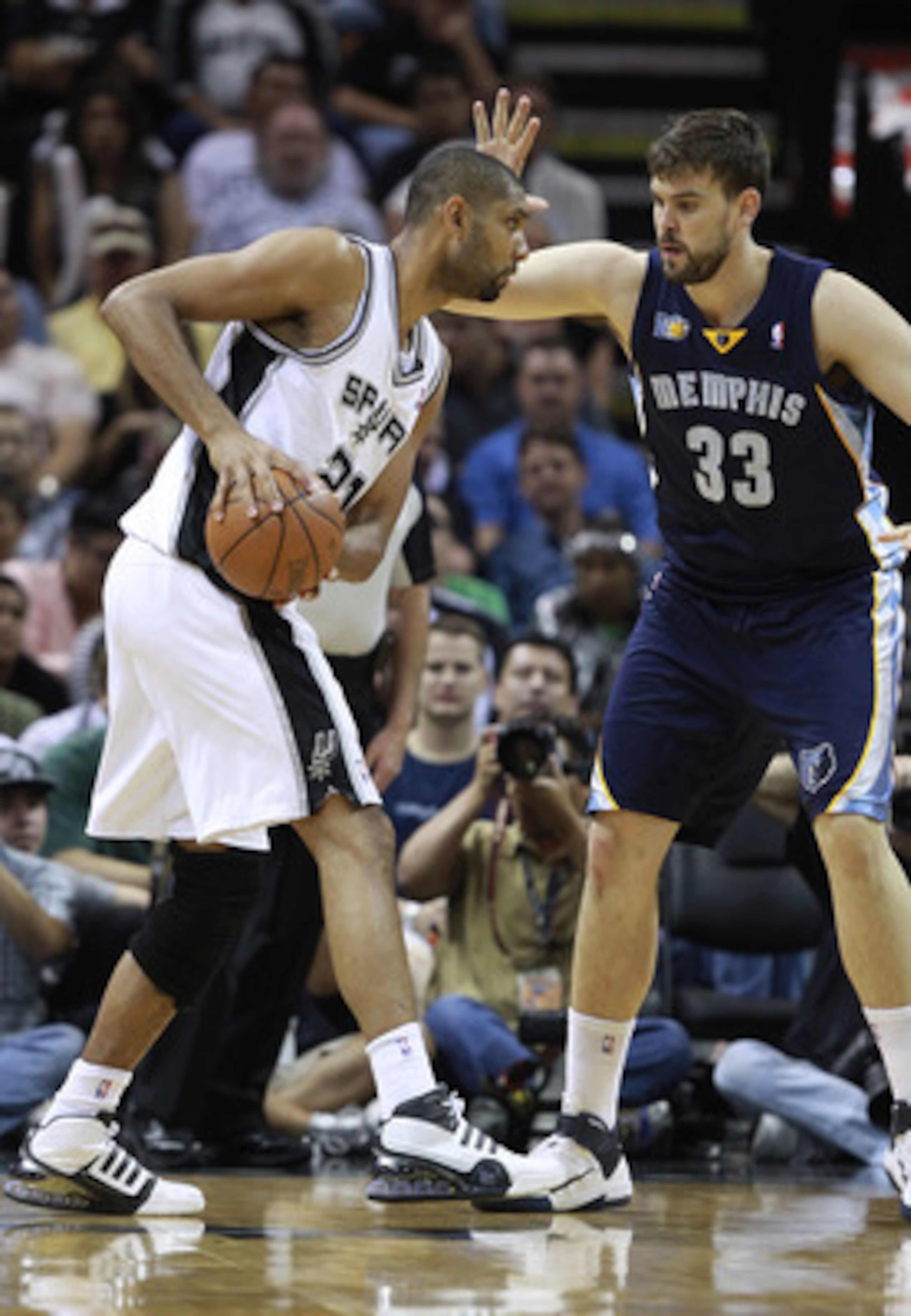 SAN ANTONIO, TX - APRIL 27: Marc Gasol #33 of the Memphis Grizzlies defends against Tim Duncan #21 of the San Antionio Spurs in Game Five of the Western Conference Quarterfinals in the 2011 NBA Playoffs on April 27, 2011 at AT&T Center in San Antonio, Tex