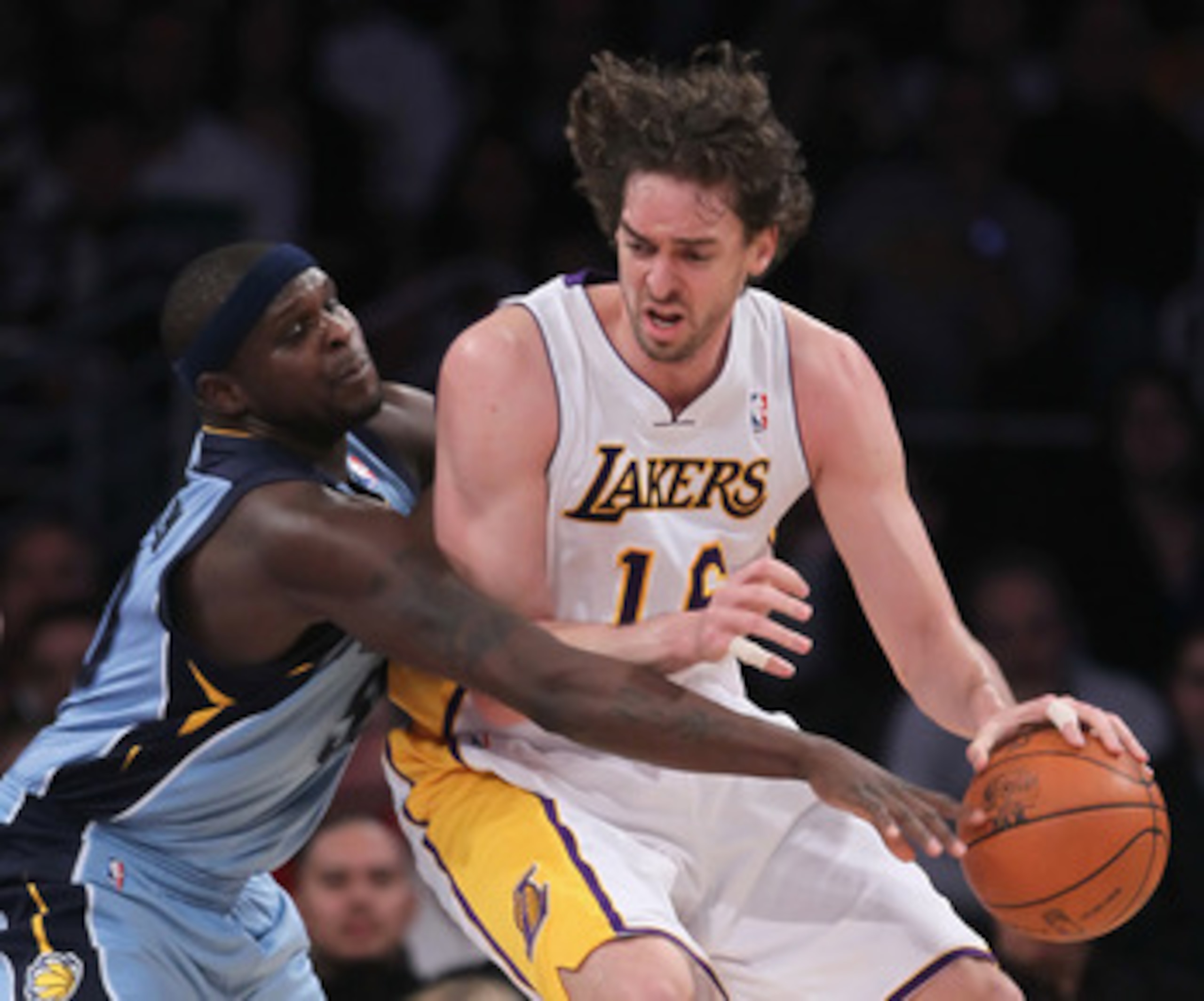LOS ANGELES, CA - JANUARY 02:  Zach Randolph #50 of the Memphis Grizzlies attempts to steal the ball away from Pau Gasol #16 of the Los Angeles Lakers during the first half at Staples Center on January 2, 2011 in Los Angeles, California. The Grizzlies def