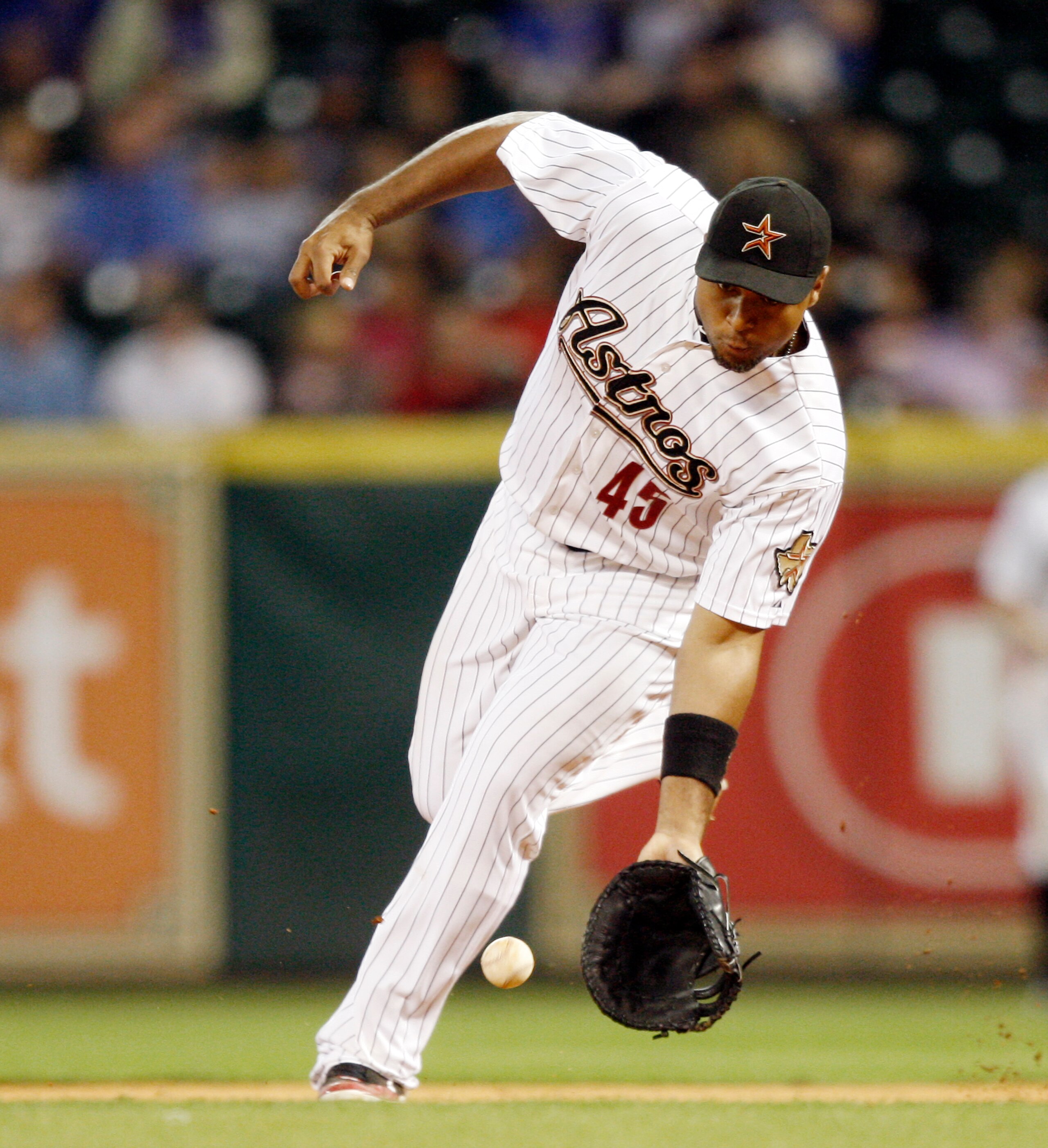 HOUSTON - APRIL 12: First baseman Carlos Lee #45 of the Houston Astros fields a ground ball against the Chicago Cubs at Minute Maid Park on April 12, 2011 in Houston, Texas. (Photo by Bob Levey/Getty Images) HOUSTON - APRIL 12: First baseman Carlos Lee #45 of the Houston Astros fields a ground ball against the Chicago Cubs at Minute Maid Park on April 12, 2011 in Houston, Texas. (Photo by Bob Levey/Getty Images)