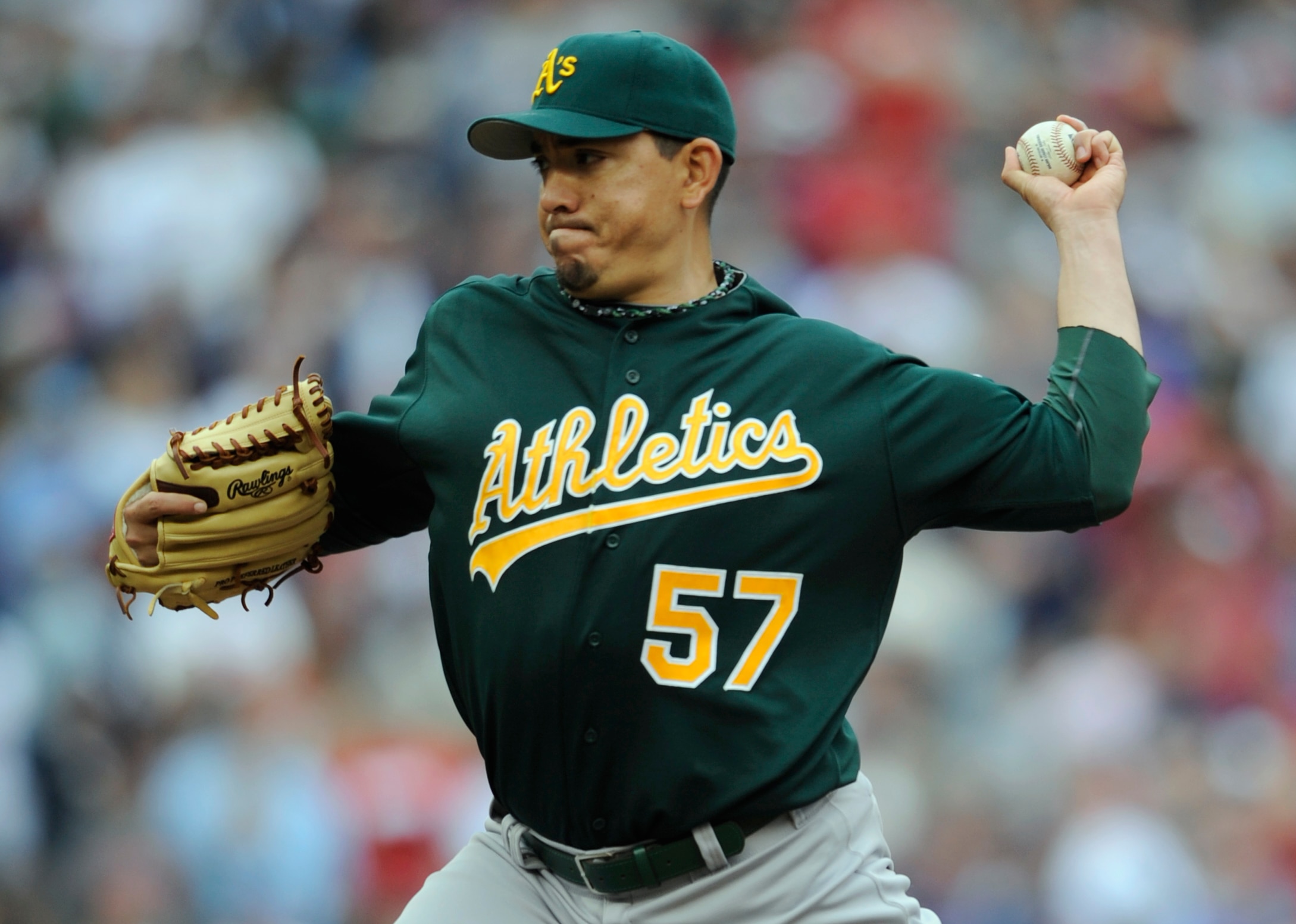 MINNEAPOLIS, MN - APRIL 10: Closer Brian Fuentes #57 of the Oakland Athletics throws against the Minnesota Twins during the ninth inning of their game on April 10, 2011 at Target Field in Minneapolis, Minnesota. Athletics defeated the Twins 5-3. (Photo by
