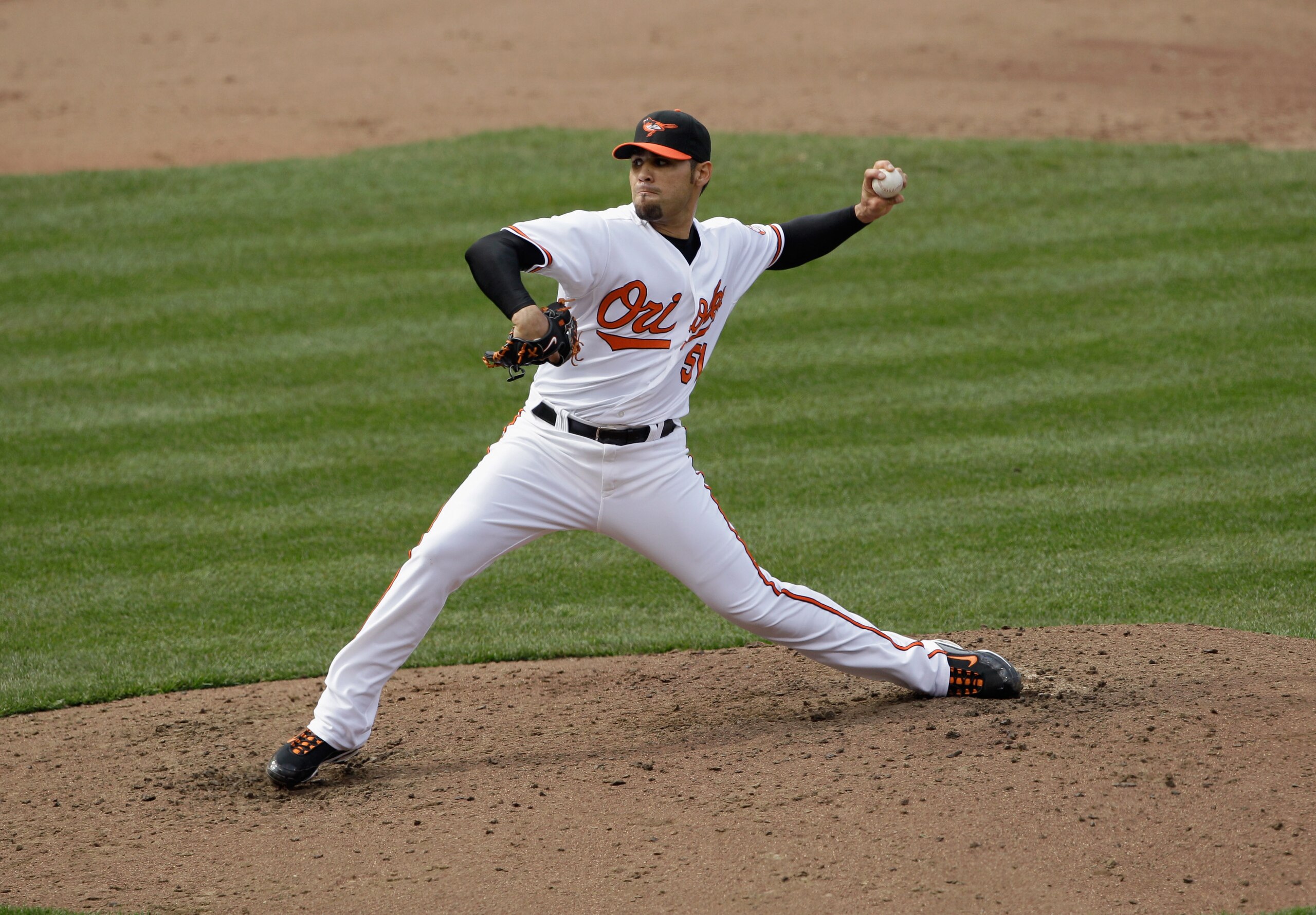 BALTIMORE, MD - APRIL 10: Pitcher Mike Gonzalez #51 of the Baltimore Orioles delivers to a Texas Rangers batter at Oriole Park at Camden Yards on April 10, 2011 in Baltimore, Maryland. (Photo by Rob Carr/Getty Images) BALTIMORE, MD - APRIL 10: Pitcher Mike Gonzalez #51 of the Baltimore Orioles delivers to a Texas Rangers batter at Oriole Park at Camden Yards on April 10, 2011 in Baltimore, Maryland. (Photo by Rob Carr/Getty Images)