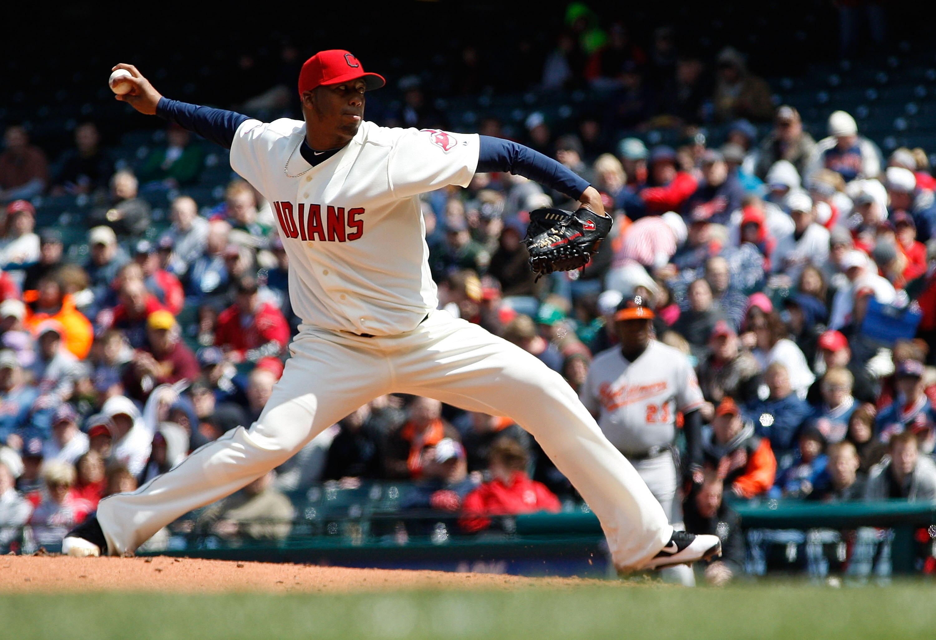 CLEVELAND - APRIL 17:  Fausto Carmona #55 of the Cleveland Indians pitches against the Baltimore Orioles during the game on April 17, 2011 at Progressive Field in Cleveland, Ohio.  (Photo by Jared Wickerham/Getty Images)