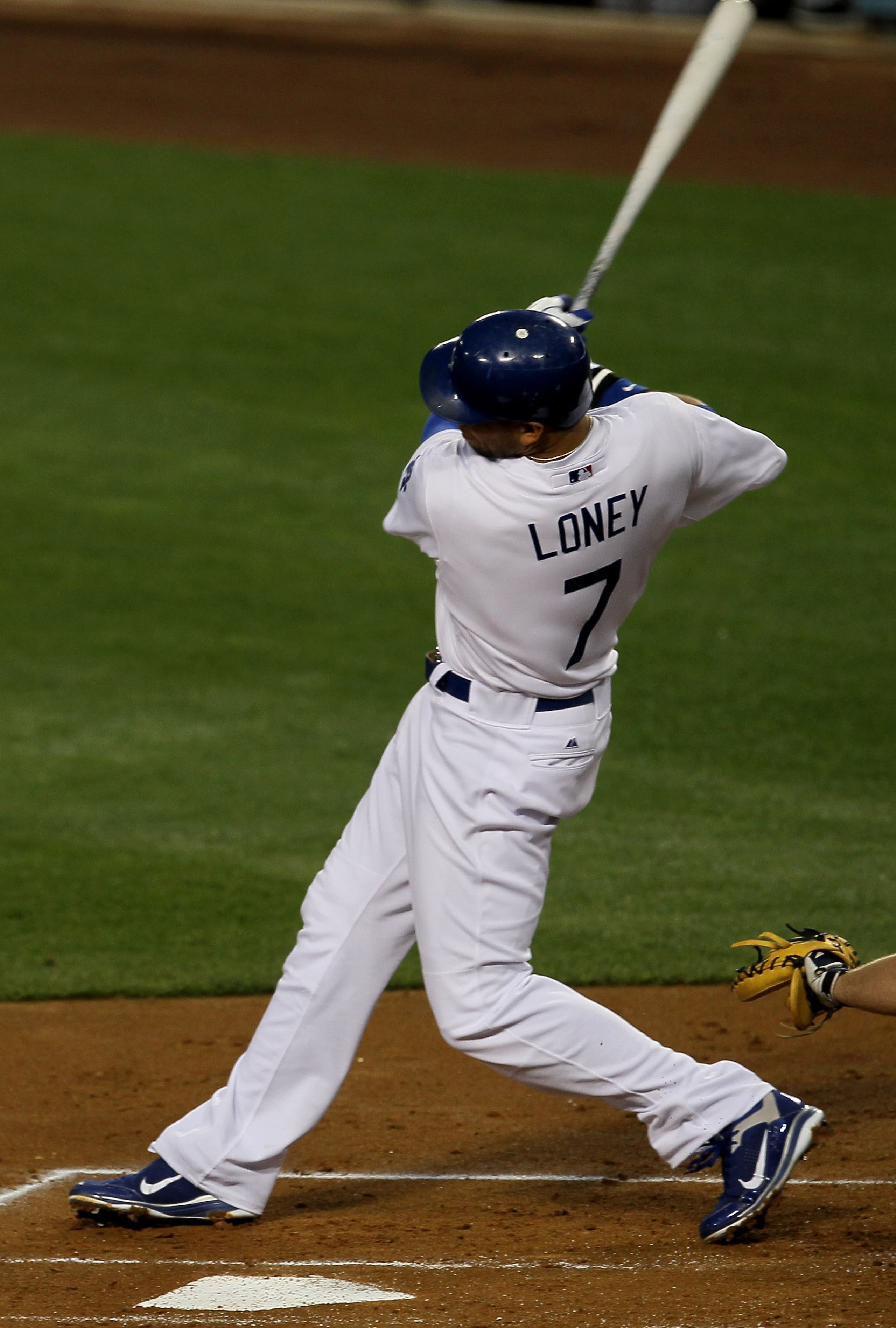 LOS ANGELES - APRIL 18: James Loney #7 of the Los Angeles Dodgers hits a two RBI single in the first inning against the Atlanta Braves on April 18, 2011 at Dodger Stadium in Los Angeles, California. (Photo by Stephen Dunn/Getty Images) LOS ANGELES - APRIL 18: James Loney #7 of the Los Angeles Dodgers hits a two RBI single in the first inning against the Atlanta Braves on April 18, 2011 at Dodger Stadium in Los Angeles, California. (Photo by Stephen Dunn/Getty Images)
