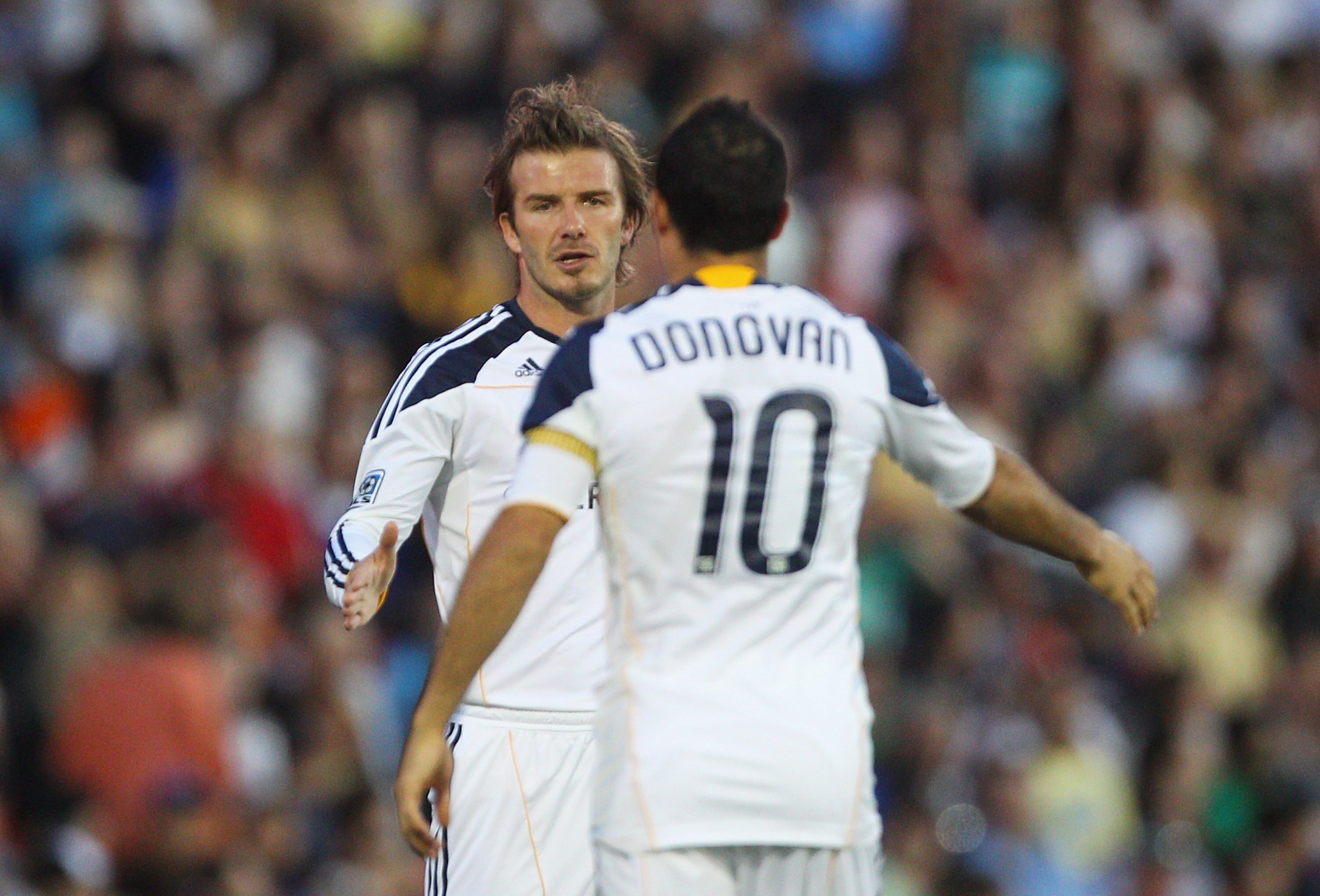 NEWCASTLE, AUSTRALIA - NOVEMBER 27:  David Beckham of the Galaxy congratulates Landon Donovan of the Galaxy after he scored a goal during the friendly match between the Newcastle Jets and the LA Galaxy at EnergyAustralia Stadium on November 27, 2010 in Ne