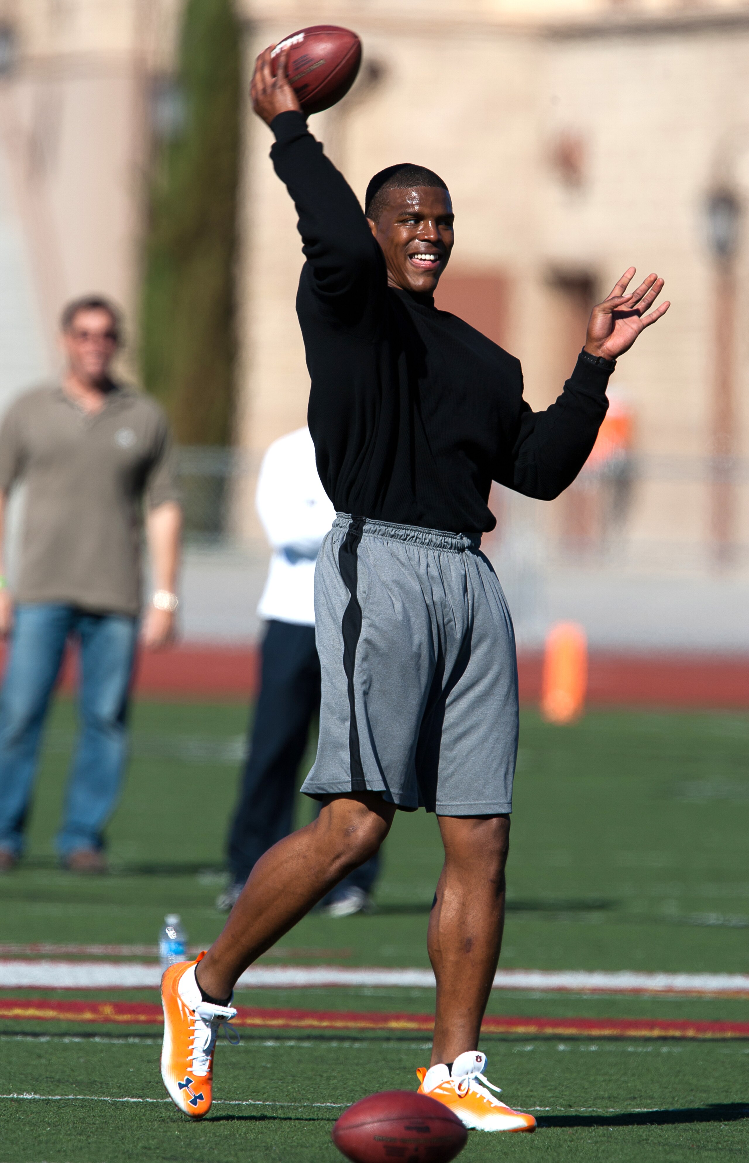 SAN DIEGO, CA - FEBRUARY 10: 2010 Heisman Trophy winning quarterback Cam Newton of Auburn throws the ball during his workout routine for the media at Cathedral High School's sports stadium on February 10, 2011 in San Diego, California. (Photo by Kent Horn SAN DIEGO, CA - FEBRUARY 10: 2010 Heisman Trophy winning quarterback Cam Newton of Auburn throws the ball during his workout routine for the media at Cathedral High School's sports stadium on February 10, 2011 in San Diego, California. (Photo by Kent Horn