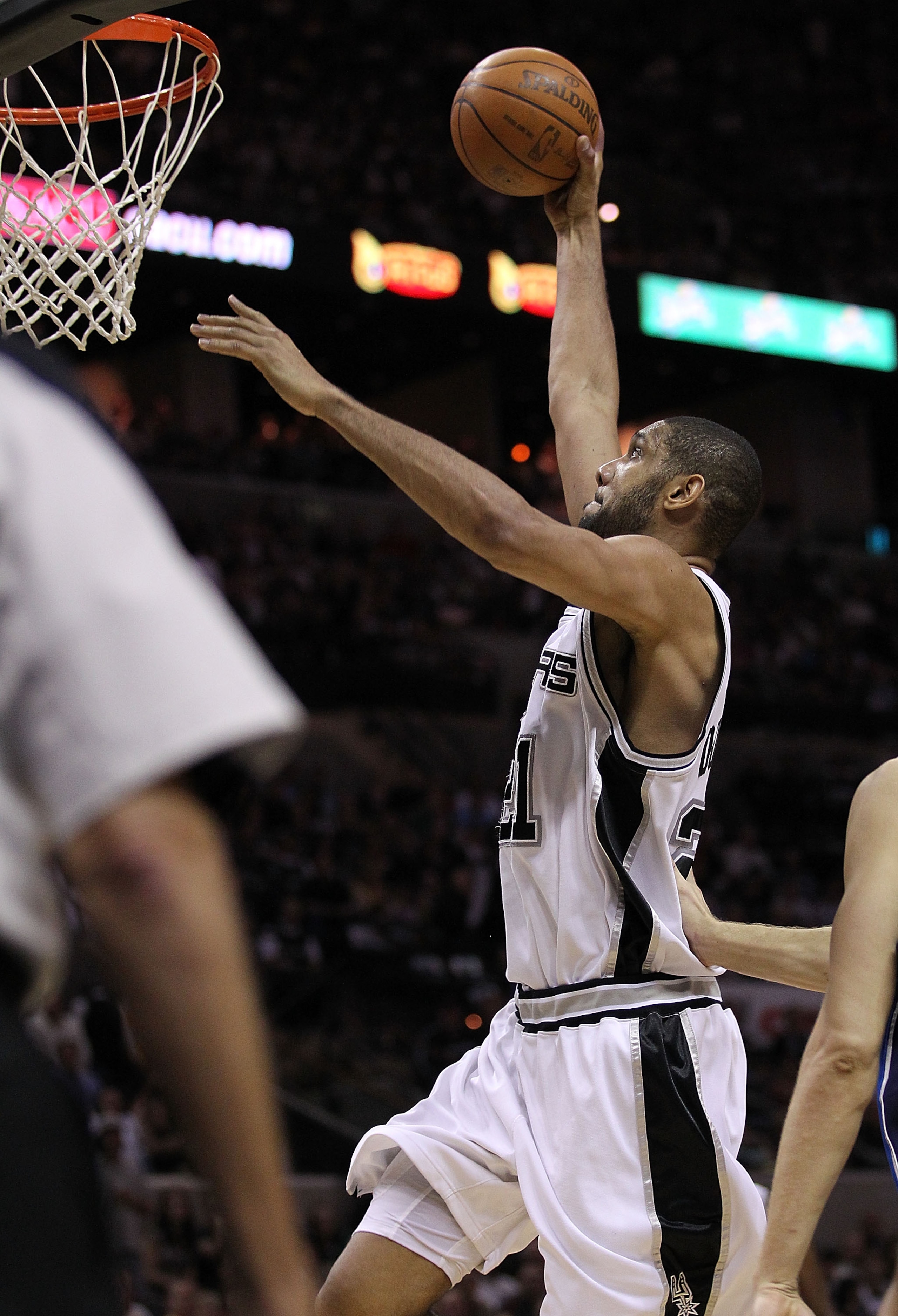 SAN ANTONIO - APRIL 23:  Forward Tim Duncan #21 of the San Antonio Spurs makes a slam dunk against the Dallas Mavericks in Game Three of the Western Conference Quarterfinals during the 2010 NBA Playoffs at AT&T Center on April 23, 2010 in San Antonio, Tex