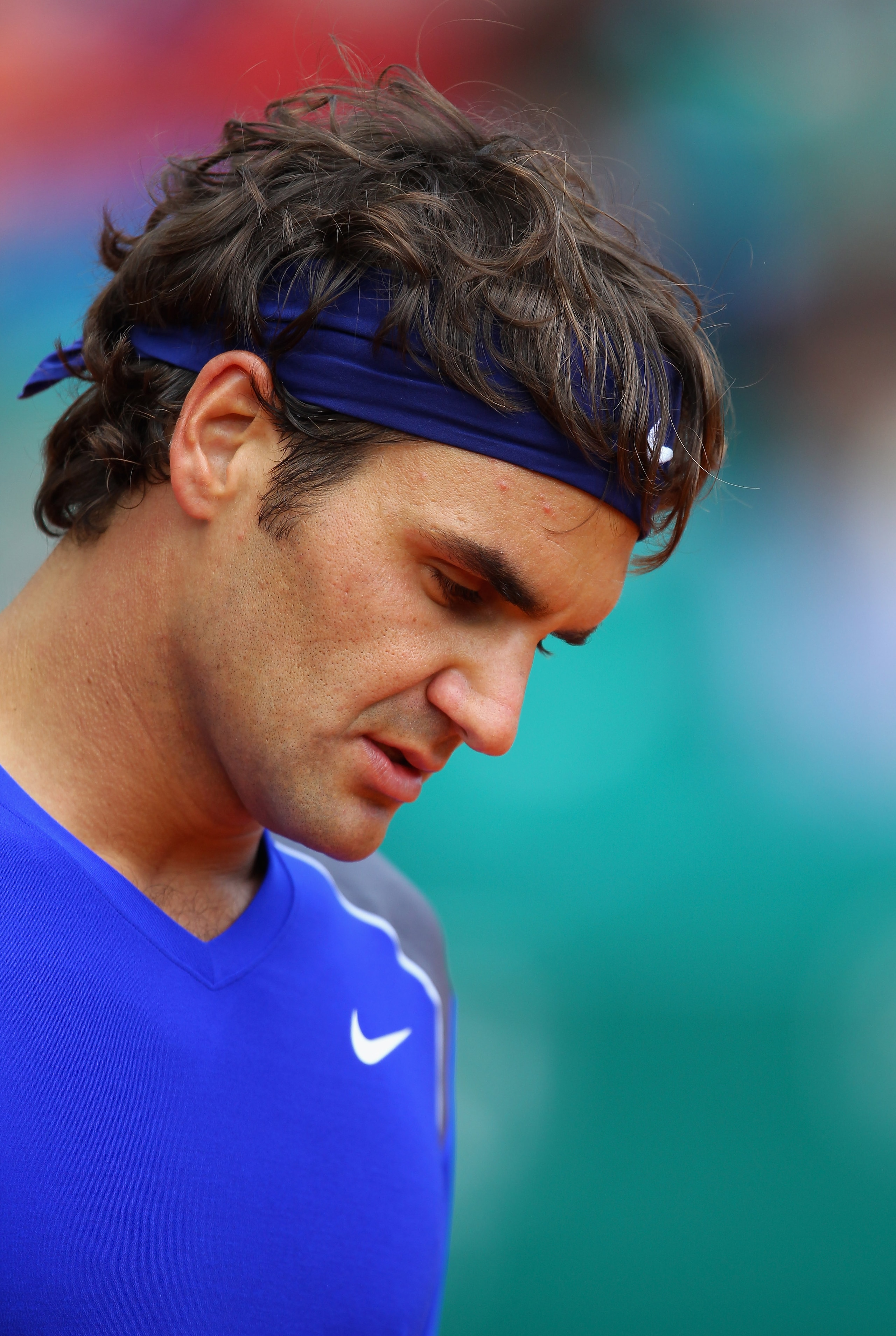 MONACO - APRIL 15:  Roger Federer of Switzerland looks down in his match against Jurgen Melzer of Austria during Day Six of the ATP Masters Series Tennis at the Monte Carlo Country Club on April 15, 2011 in Monte Carlo, Monaco.  (Photo by Julian Finney/Ge