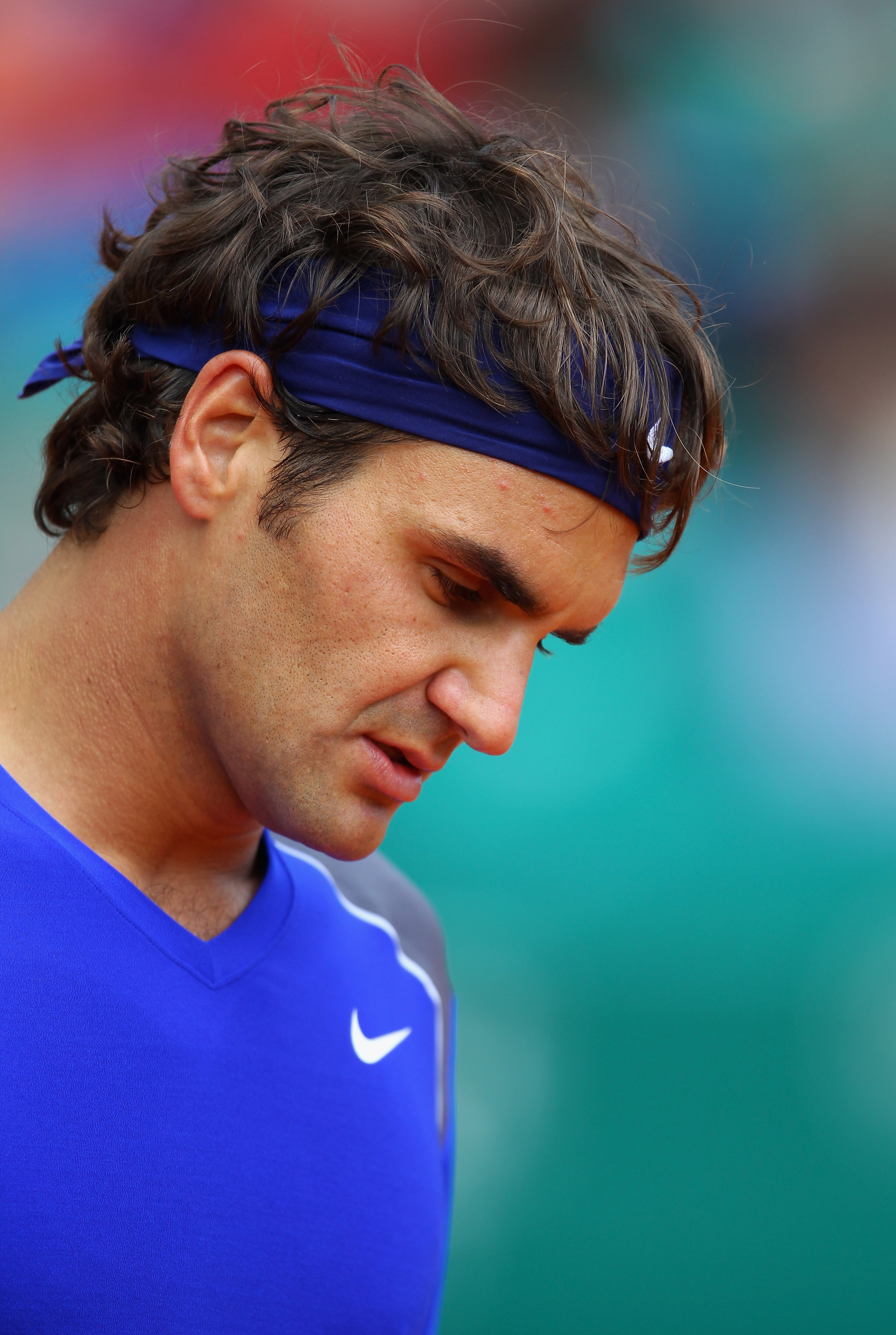 MONACO - APRIL 15:  Roger Federer of Switzerland looks down in his match against Jurgen Melzer of Austria during Day Six of the ATP Masters Series Tennis at the Monte Carlo Country Club on April 15, 2011 in Monte Carlo, Monaco.  (Photo by Julian Finney/Ge