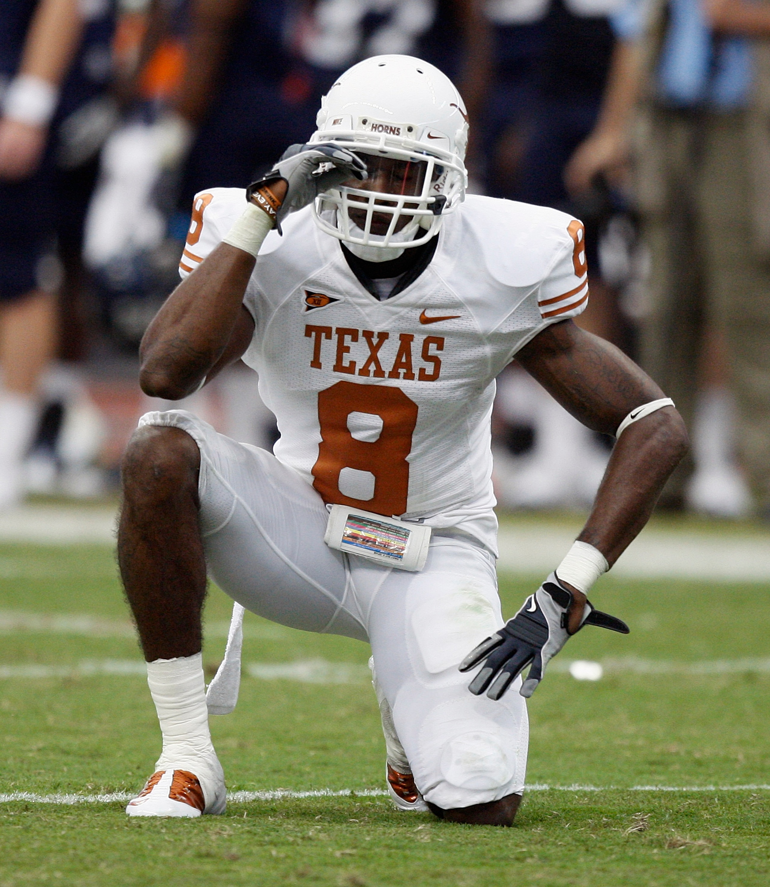 HOUSTON - SEPTEMBER 04:  Cornerback Chykie Brown #8 of the Texas Longhorns reacts after almost intercepting a pass against the Rice Owls at Reliant Stadium on September 4, 2010 in Houston, Texas. Texas beat Rice 34-17.  (Photo by Bob Levey/Getty Images)